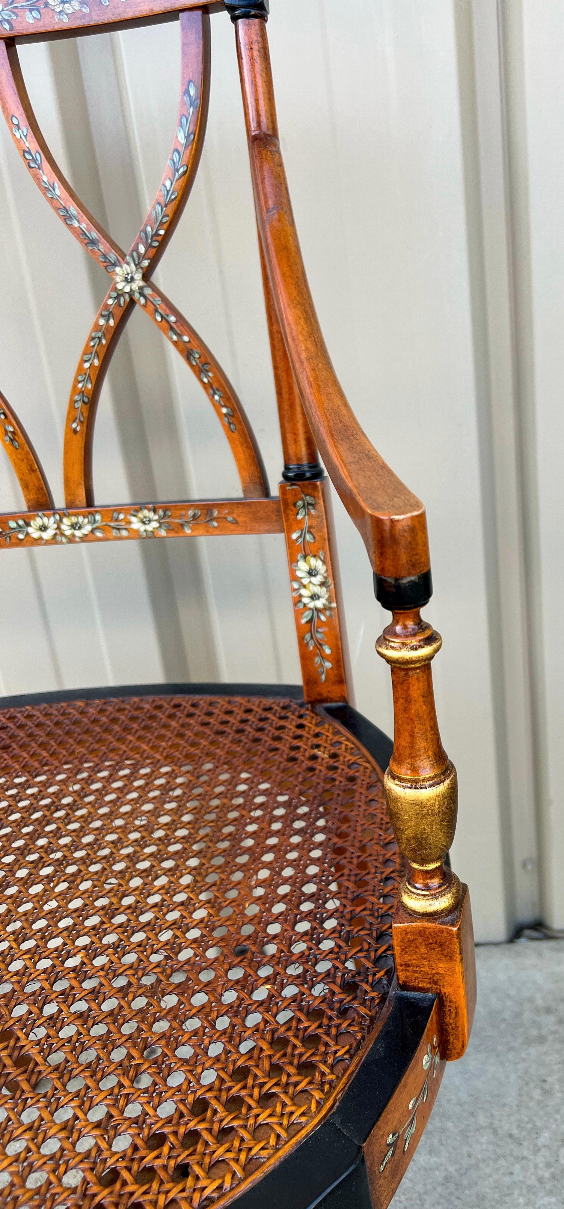 Original paint is always a favorite! This is a pair of Adam style painted satinwood chairs with caned seats. The vintage cushion is fair, but the chairs are exquisite. Note the gilded accents as well!