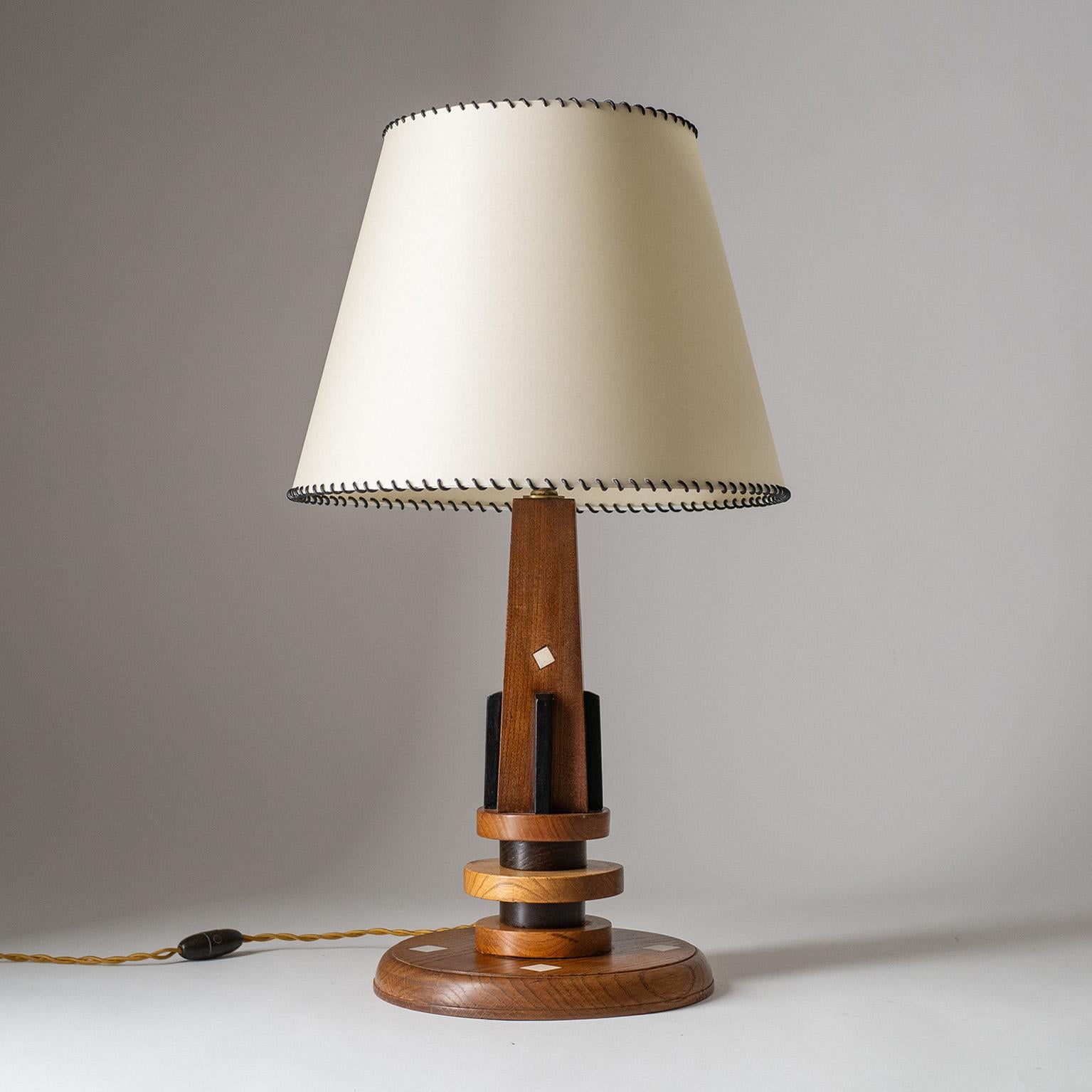 Rare early Adnet table lamp from the 1920s. Obelisk-shaped base made of Oak (partially stained) with bone inlays. Signed in the base 