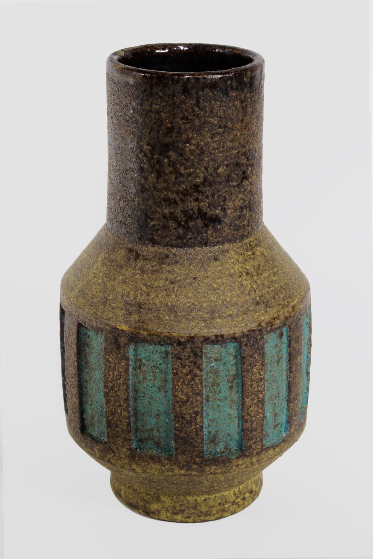 A hand-thrown stoneware vase by master ceramicist Aldo Londi for Bitossi, circa 1950. Subtle in every detail from the heavily textured clay body surface to a shifting oxide coloration of brown, yellow and black to the gently recessed turquoise