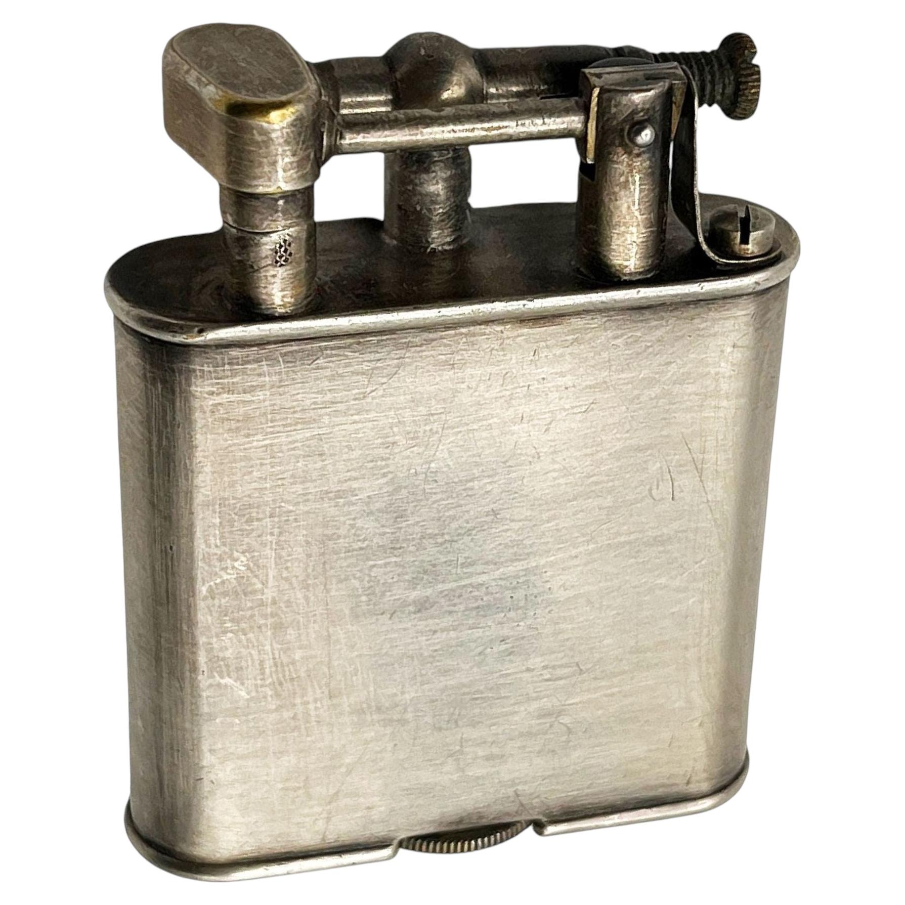 1920s cigarette lighter classic 1920's Ronson De-Light Nickel Silver Lighter Elegant Lighters :: Selling & repairing known companies like Dunhill Thorens lighter page--History of Thorens