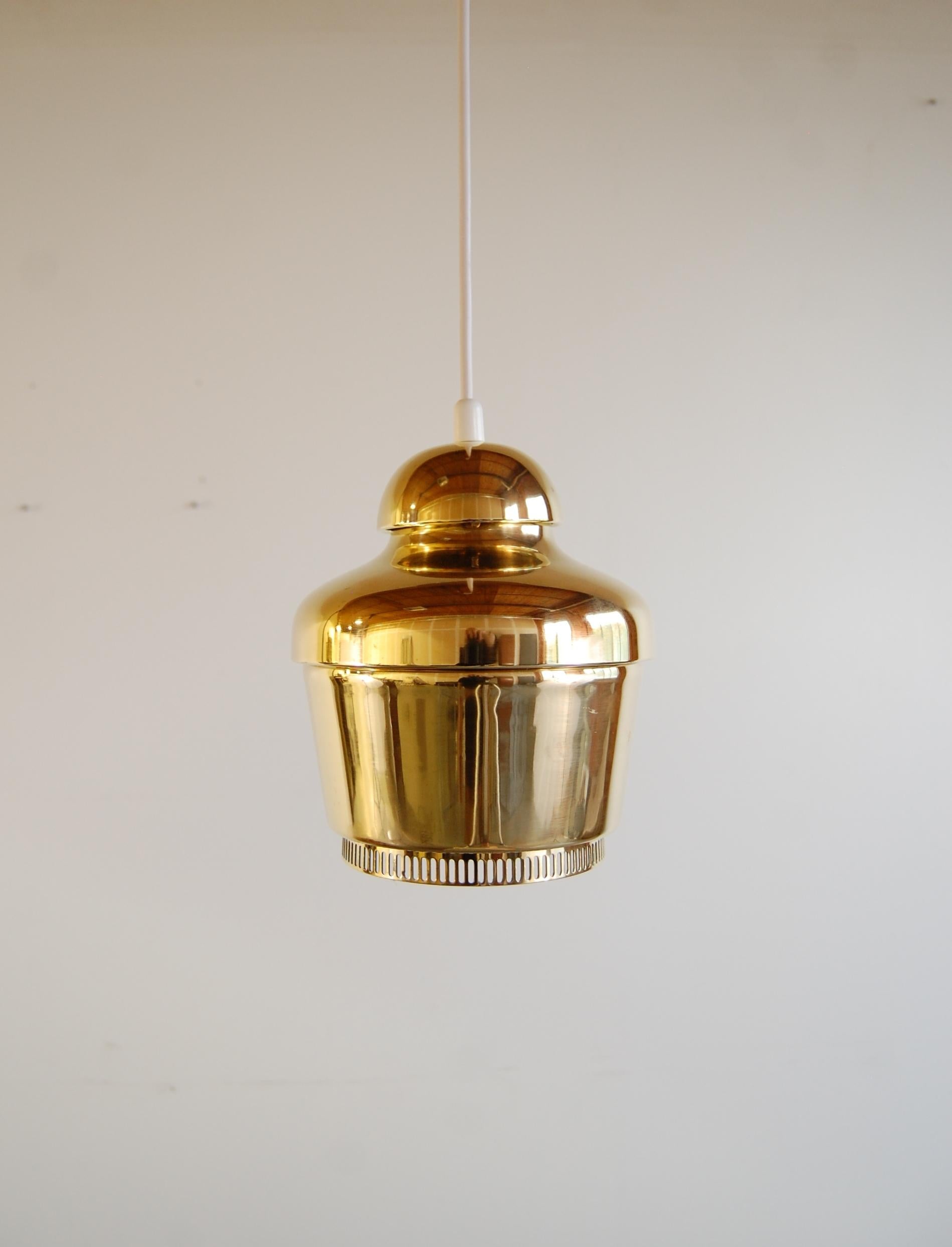 Early A330 pendant lamp, designed by Alvar Aalto, circa 1954, and produced by Valaistustyö Ky
Finland. Comes with optional wall mount swing arm. Solid brass. Newly polished and re-wired. Signed with impressed manufacturer's mark to interior