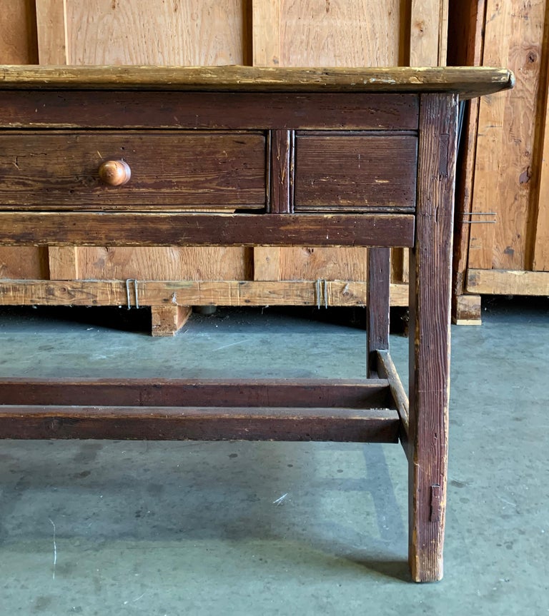 Wooden work table with two knobs and drawers in immaculate condition.