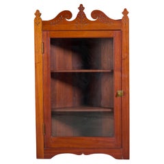 Antique Early American Corner Cabinet with Carved Pediment
