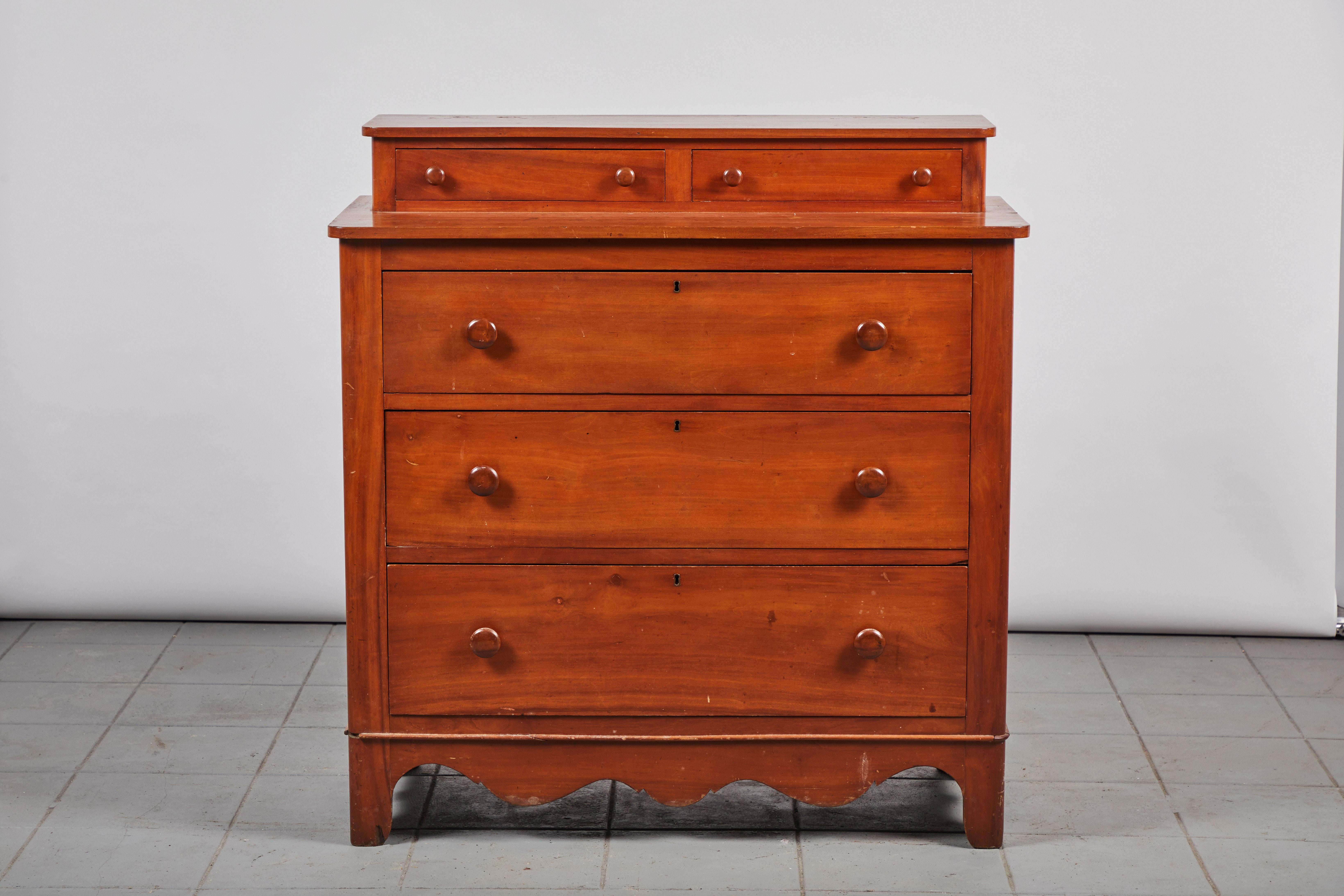 Early American five-drawer dresser, this dresser offers three lower wide drawers with two small petite vanity drawers on top.