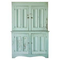 Early American Four Door Step Back Cupboard