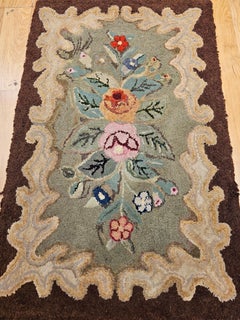 Early American Hand Hooked Rug with a Floral Pattern