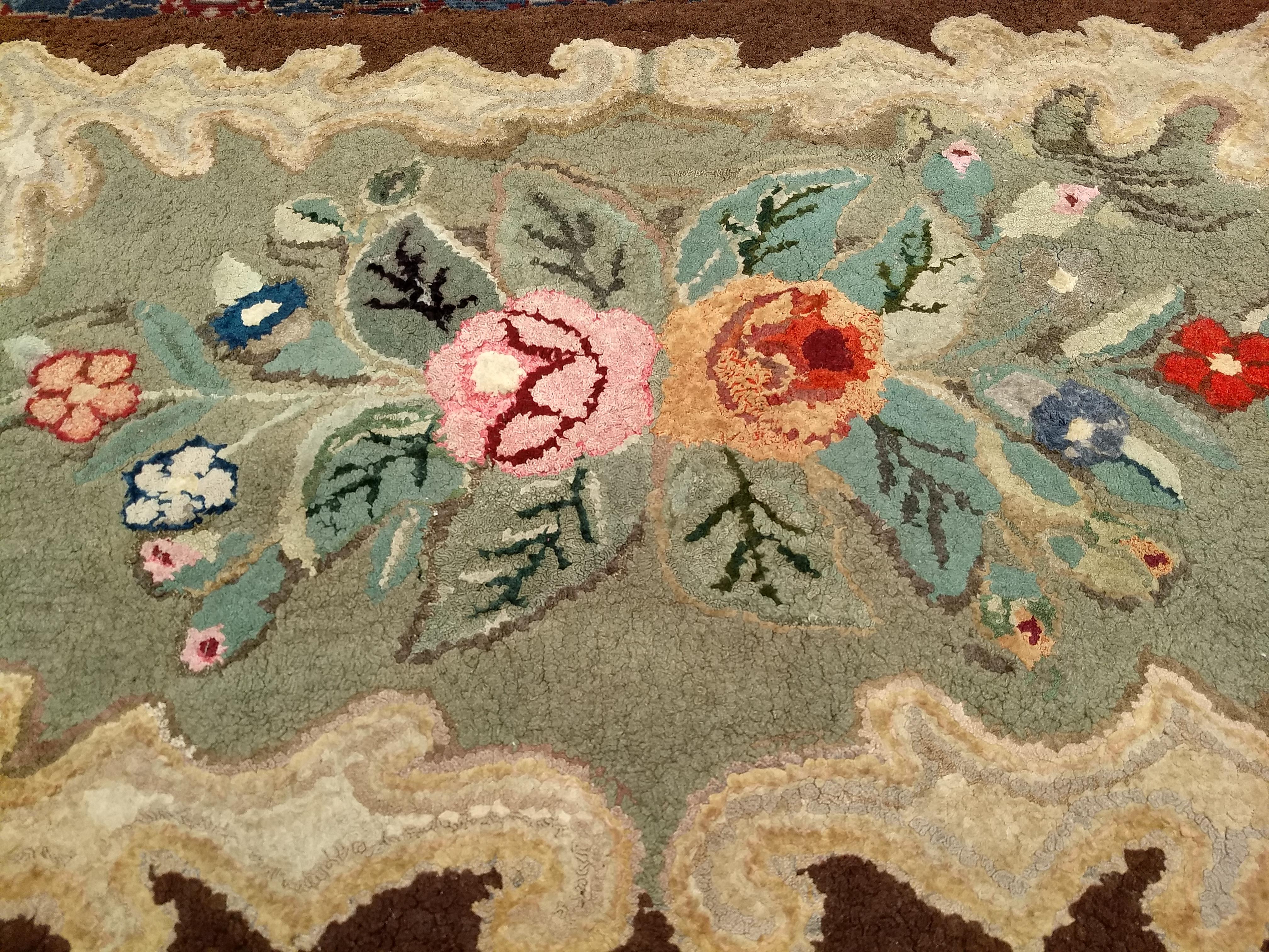 Early American Hand Hooked Rug with a Floral Pattern Wall Art In Good Condition For Sale In Barrington, IL