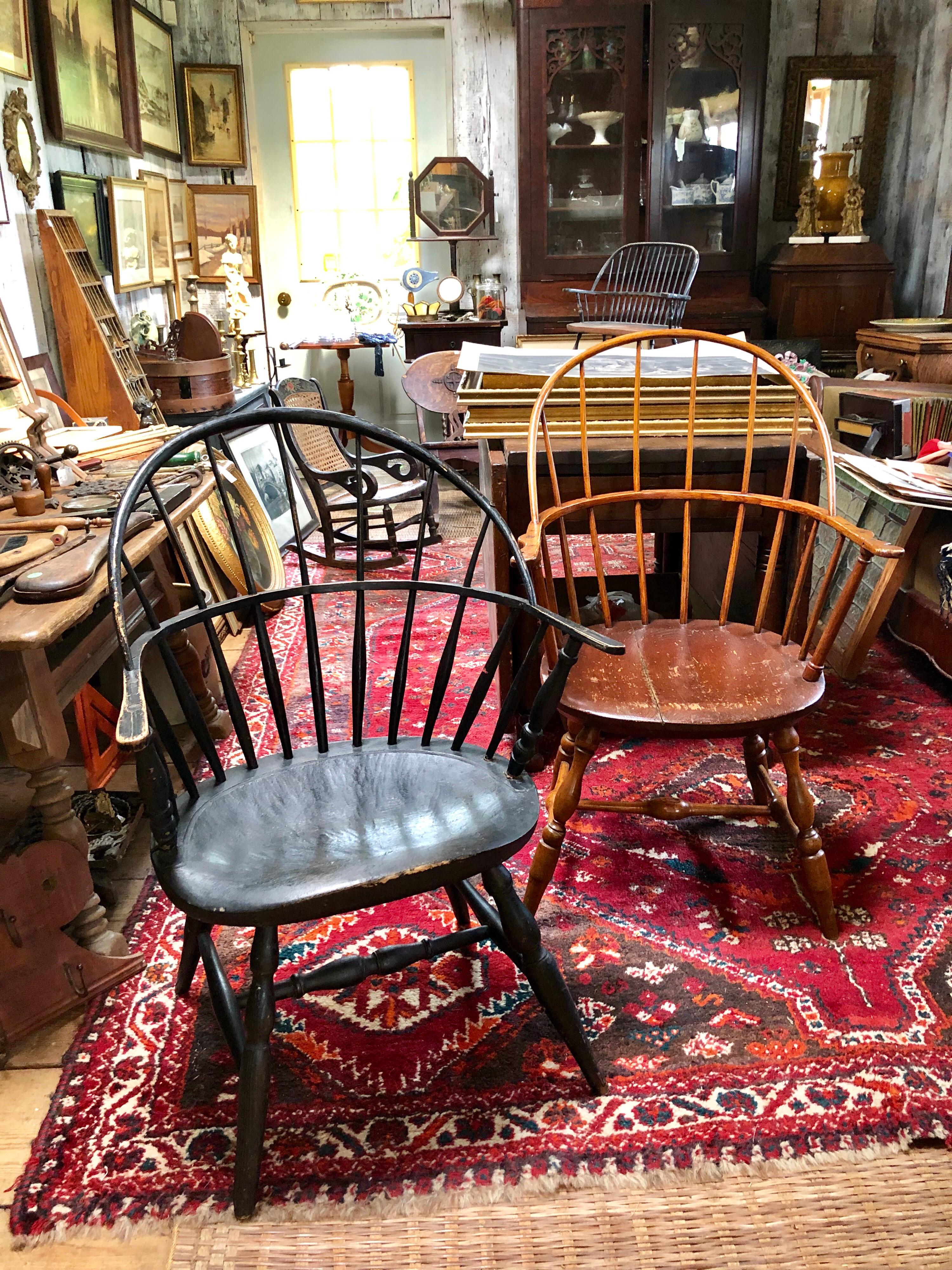 Early 1800s Windsor chair, with continuous wood hoop back and arms. Wide saddle seat and H stretchers. All original. Seat repaired, see photos. Lovely color.

American New England
1840s
Oak and hickory

37.5” tall
17.75” wide at base