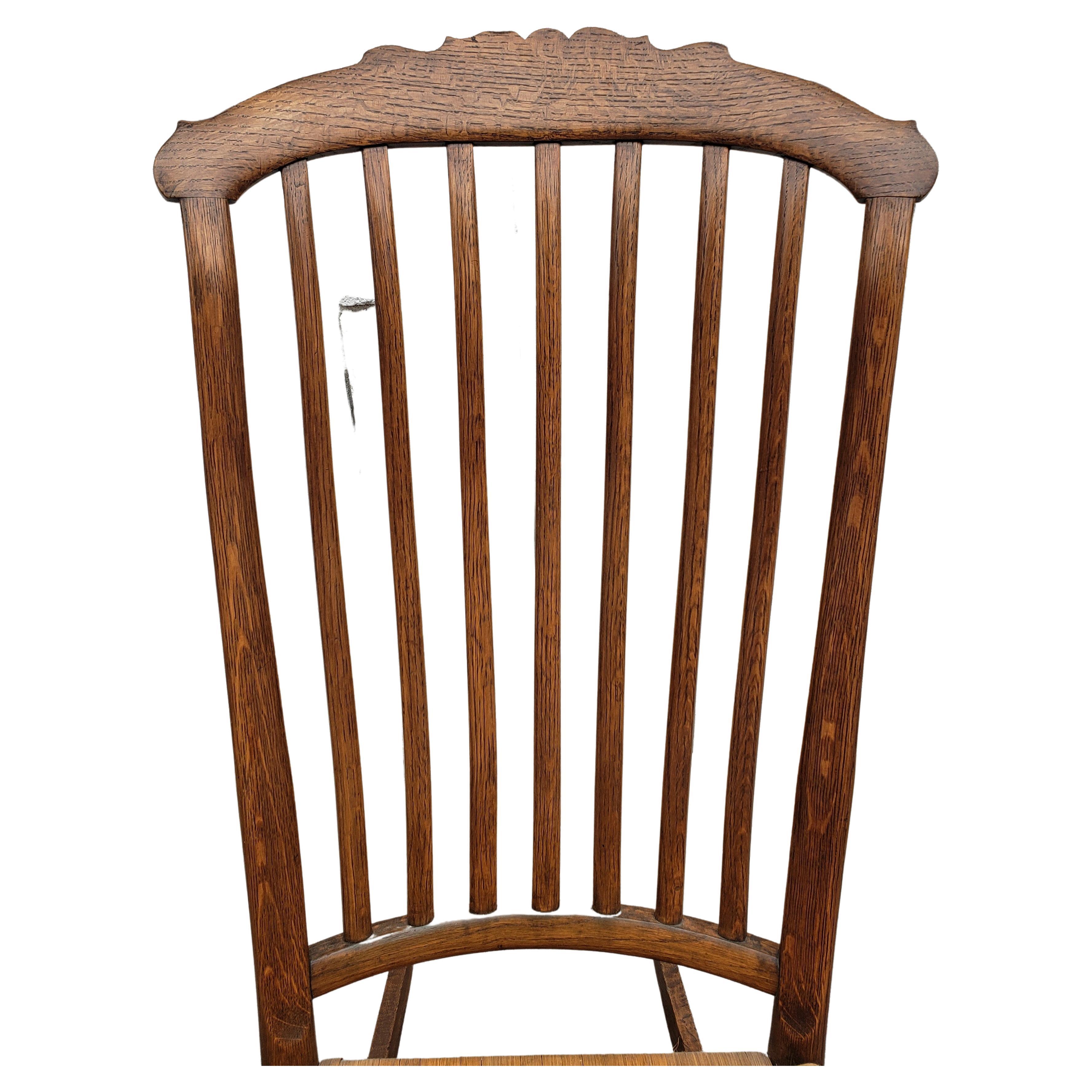 American Colonial Early American Oak and Split Reed Seat Rocker, Circa 1960s For Sale