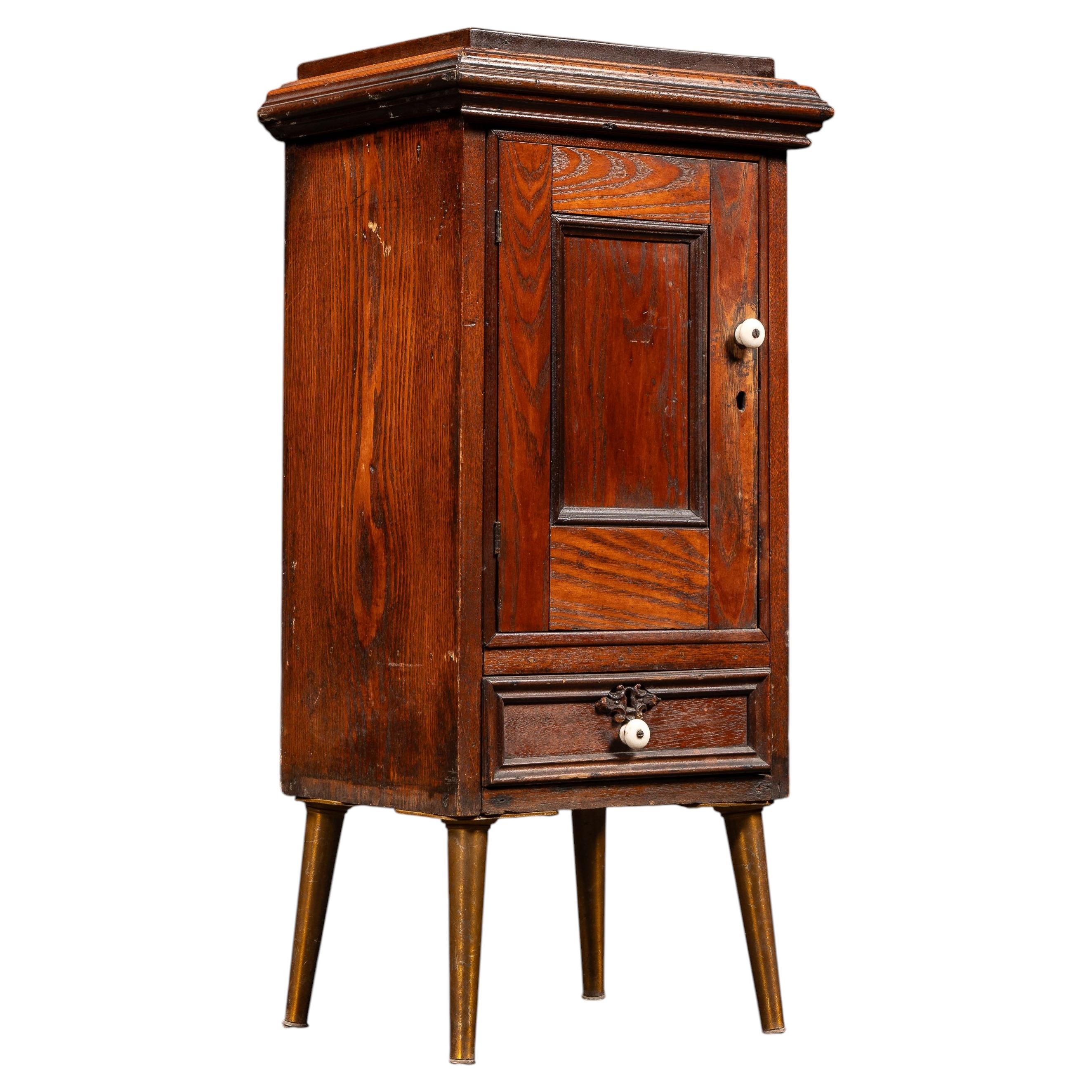 Early American Oak Cabinet with Tapered Brass-Capped Legs