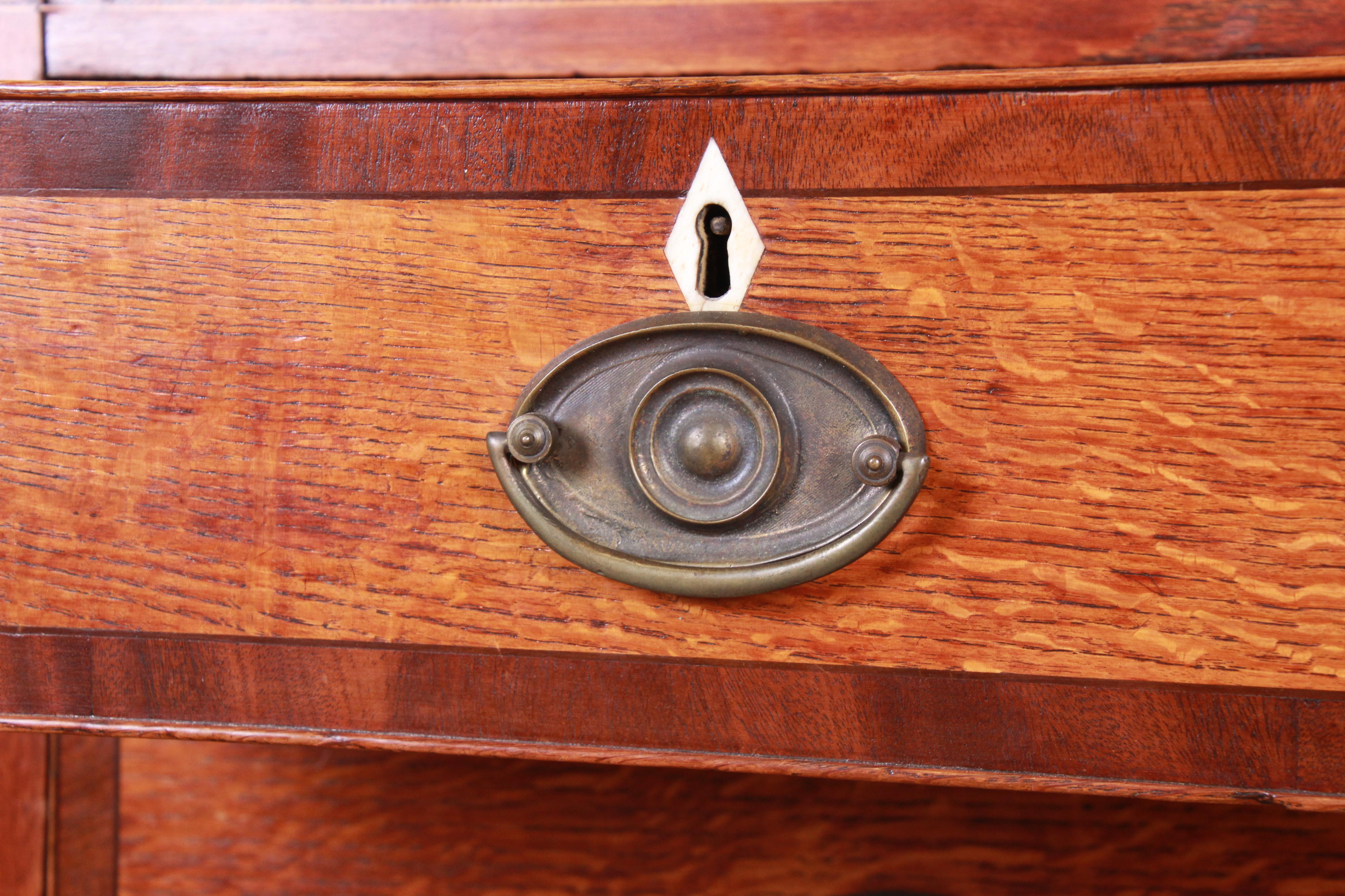 Brass Early American Oak, Inlaid Mahogany, and Bone Inlay Chest of Drawers, circa 1820