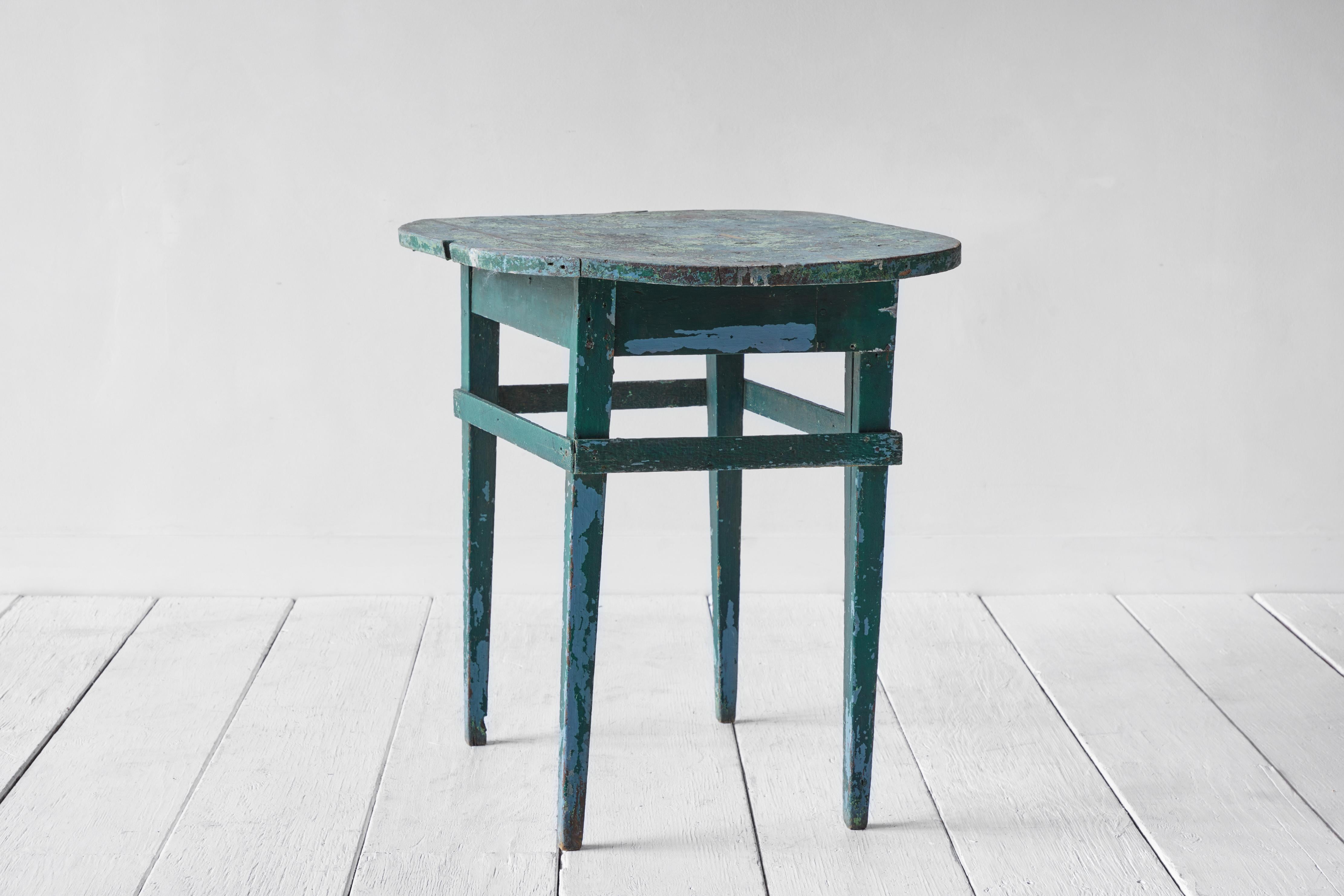 Rustic early American painted green wood side table.