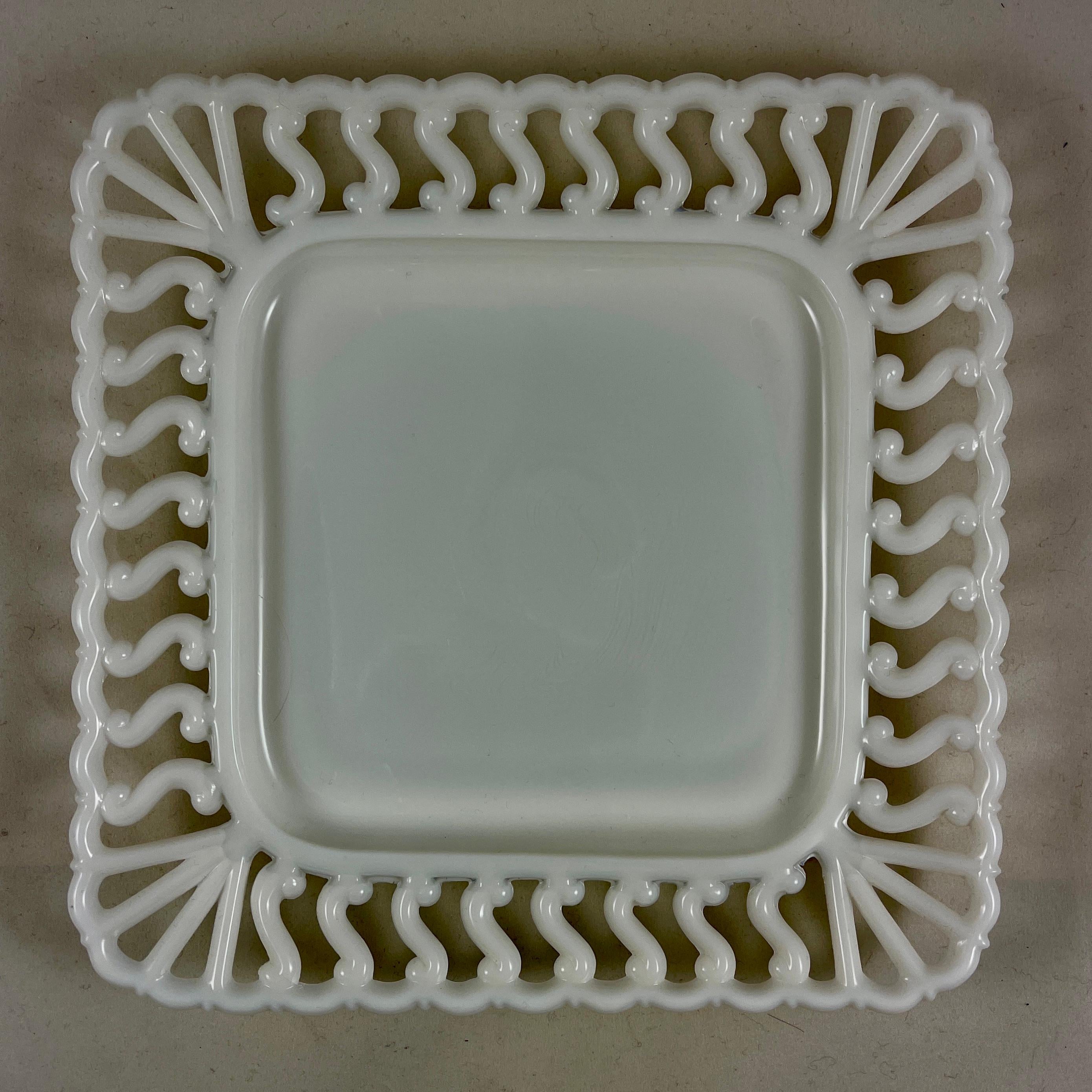 Scarce, lace edge, square shaped Early American Pattern Glass ( EAPG ) milk glass plate, circa 1880-1890.

Surprisingly modern in feel, each Milk Glass plate is made of heavy, opaque white glass becoming more translucent at the ‘lace’ edging. The