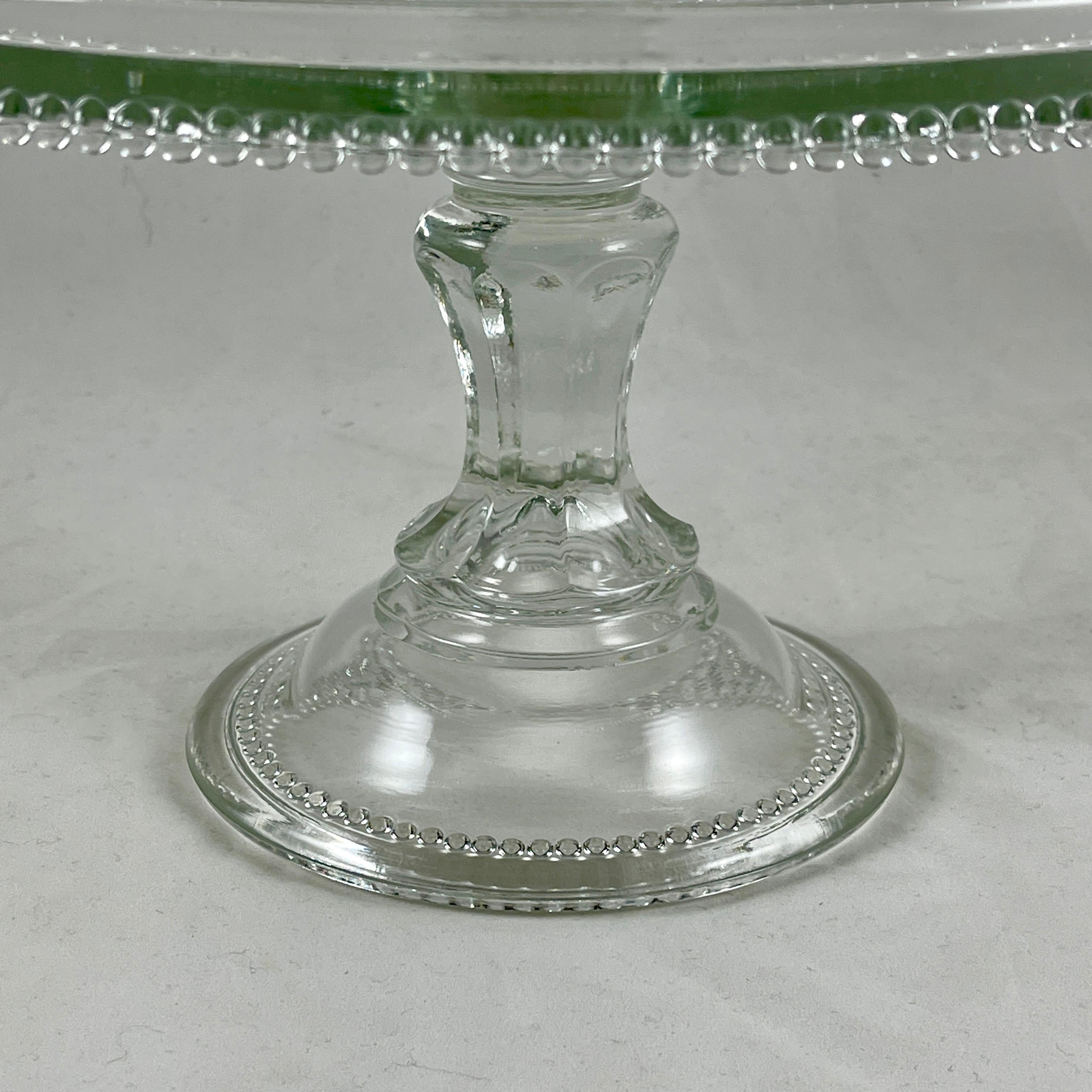 Molded Early American Pressed Nonflint Colorless Glass Beaded Cake Stand