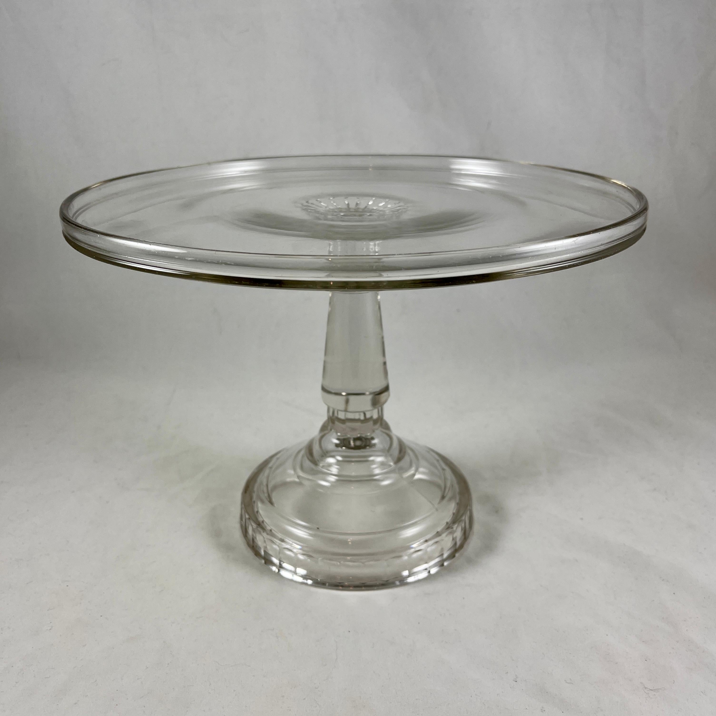 American Classical Early American Pressed Nonflint Colorless Glass Tall Paneled Cake Stand