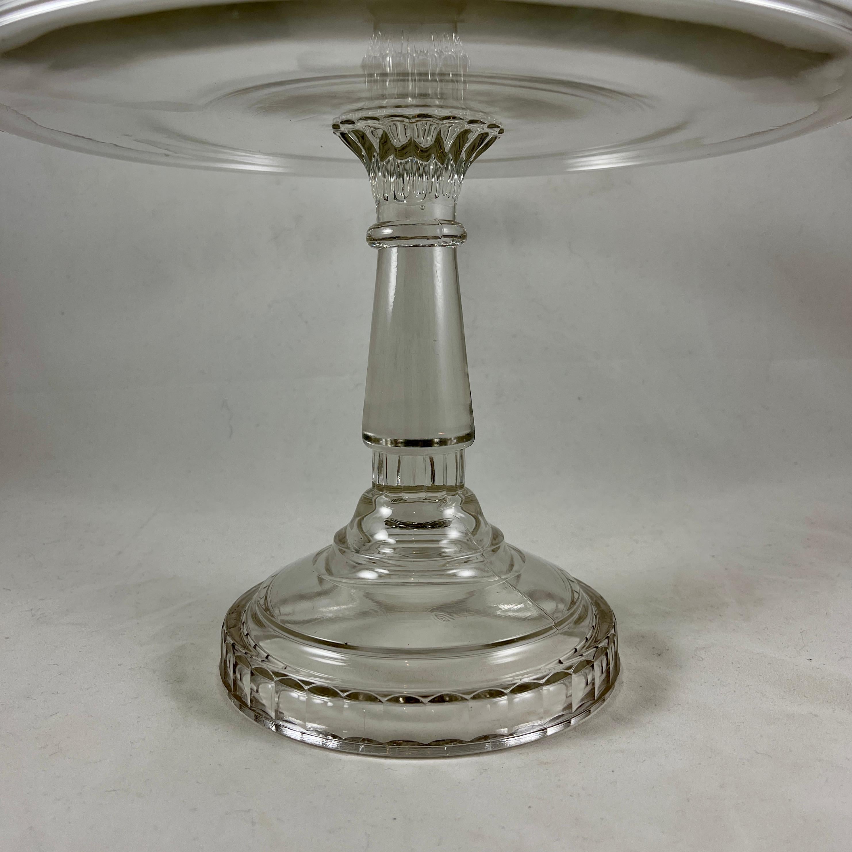 Early American Pressed Nonflint Colorless Glass Tall Paneled Cake Stand In Good Condition In Philadelphia, PA