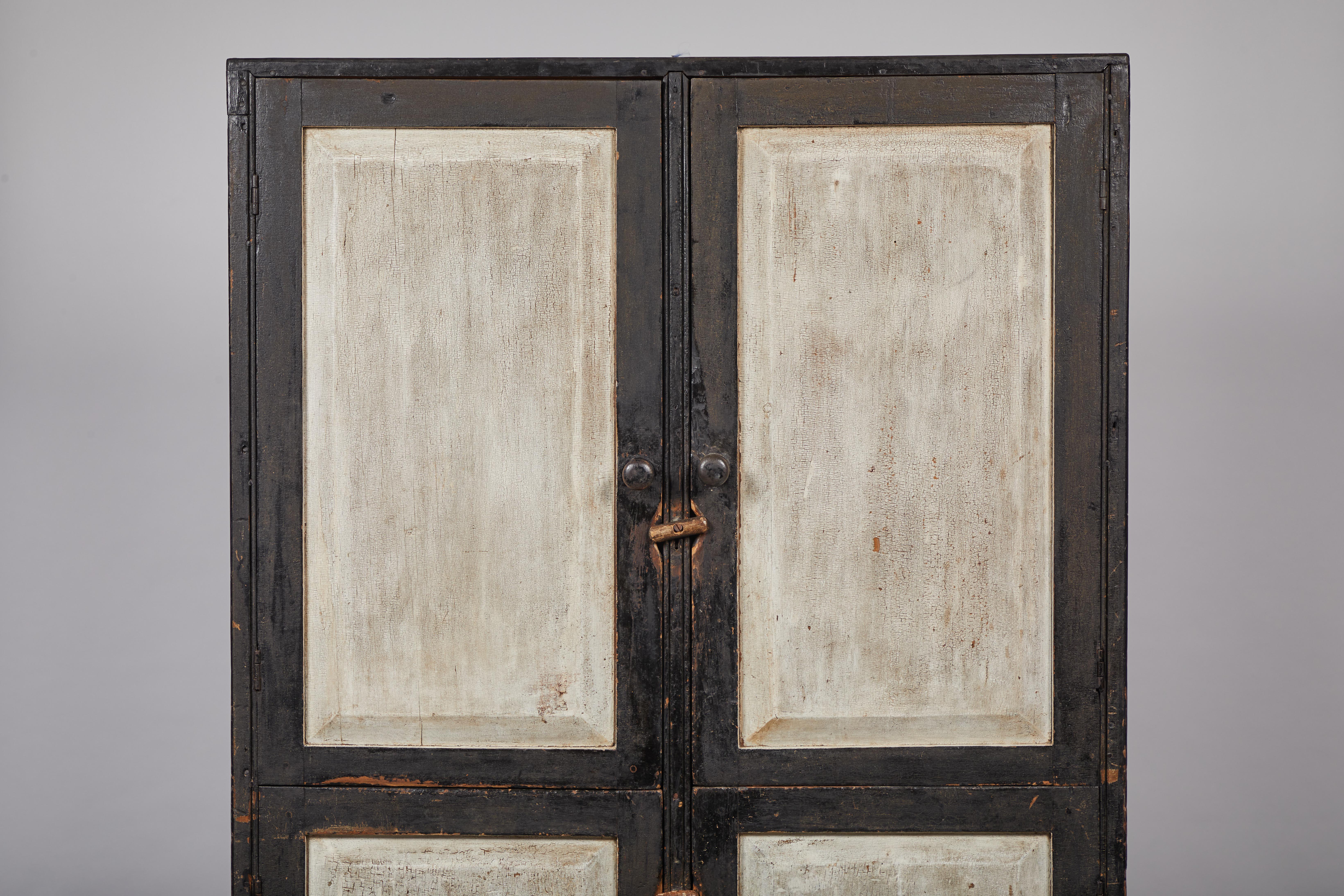 Early American Rustic Black and White Four-Door Cabinet In Fair Condition In Los Angeles, CA
