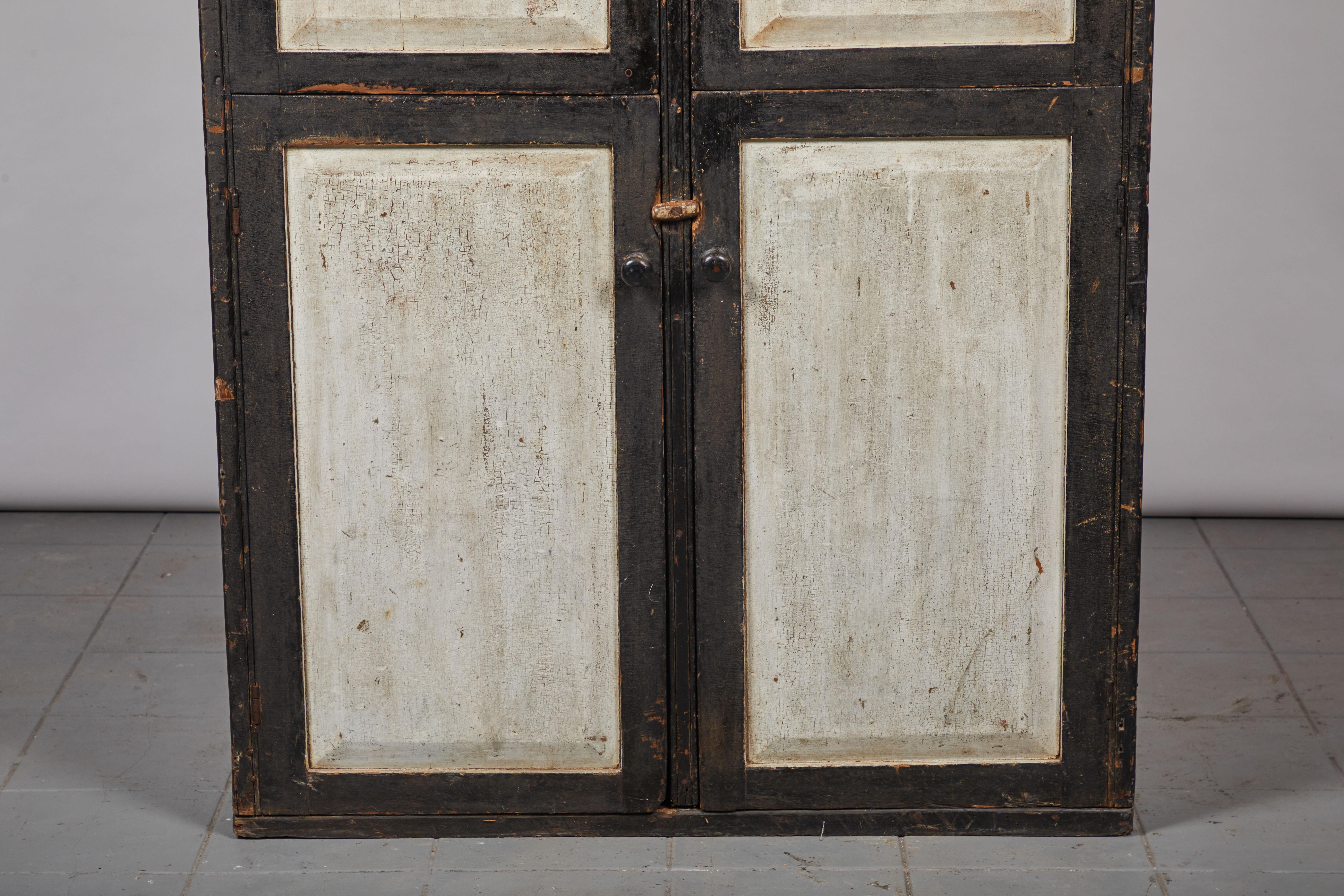 19th Century Early American Rustic Black and White Four-Door Cabinet