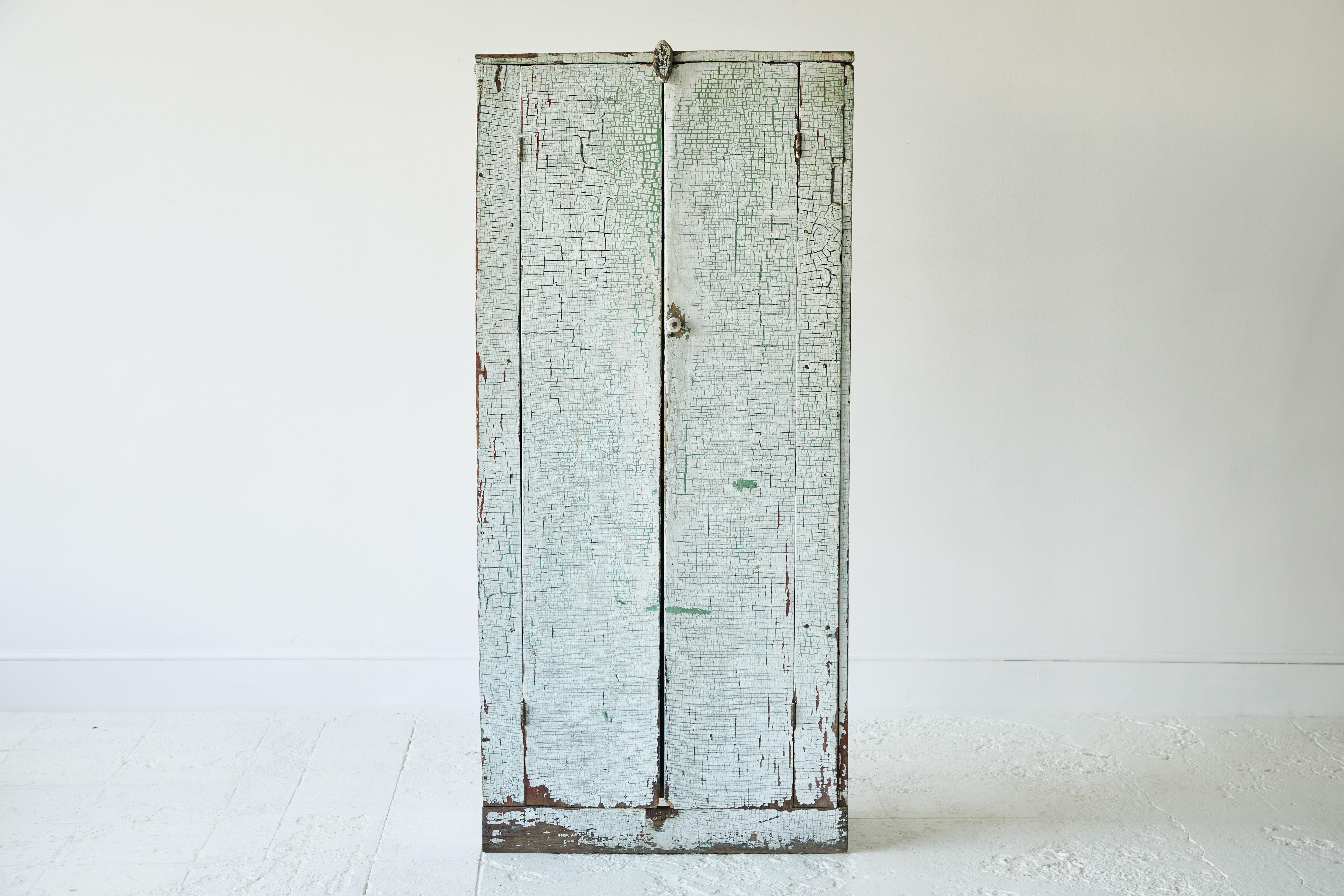 20th Century Early American Rustic Painted Two-Door Cabinet