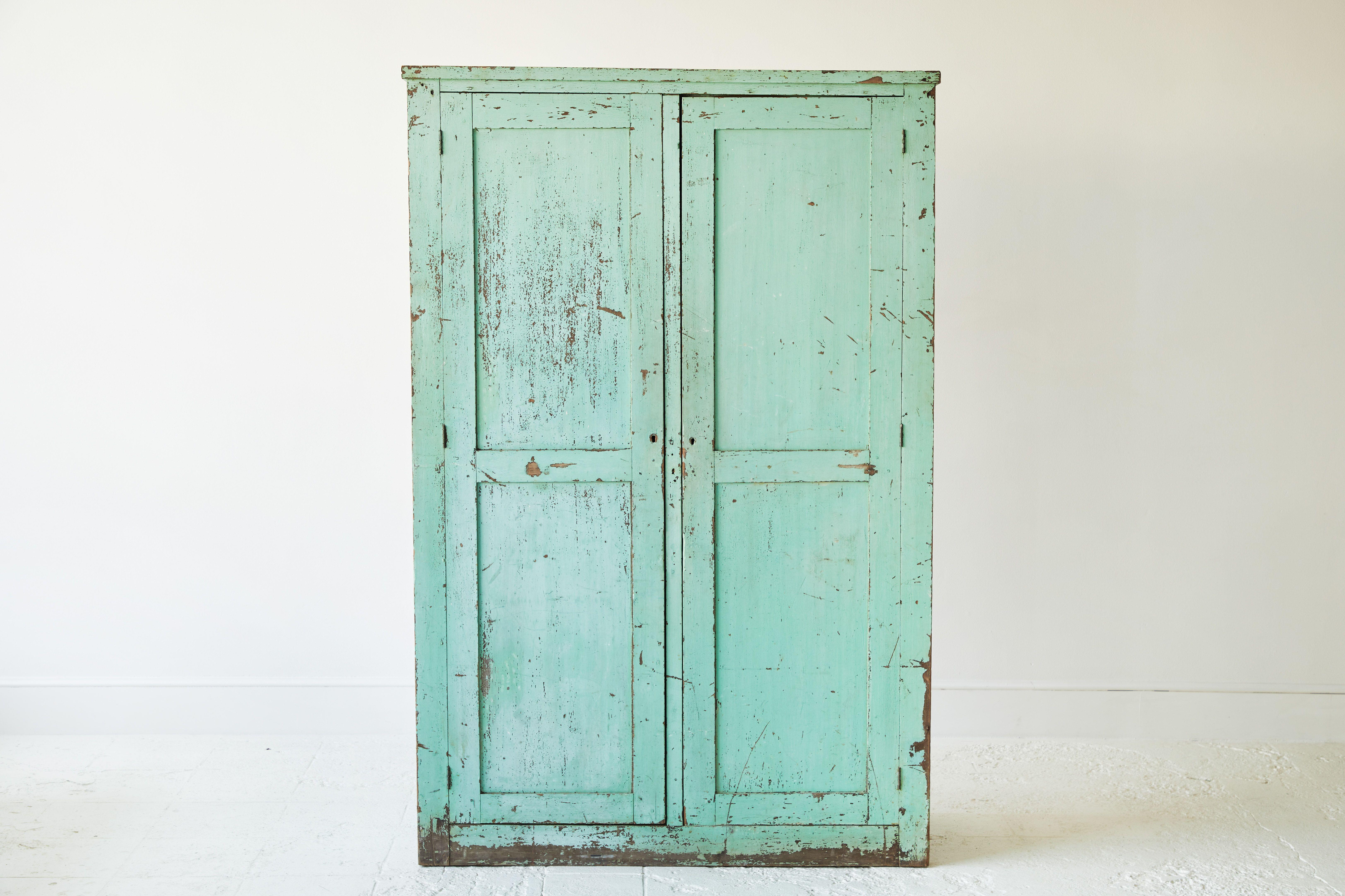 20th Century Early American Rustic Painted Two-Door Cabinet