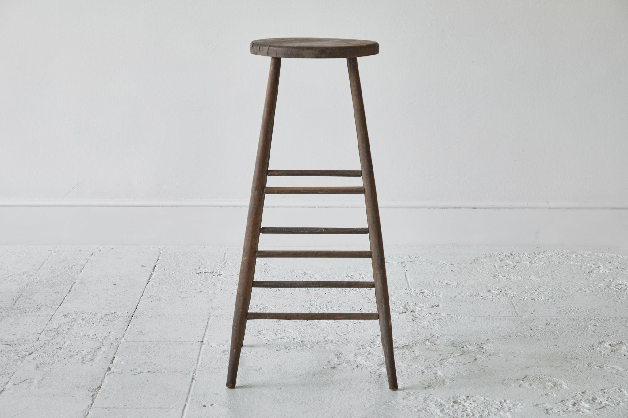 Early American rustic tall stool, with four turned legs. Seat measures: 13