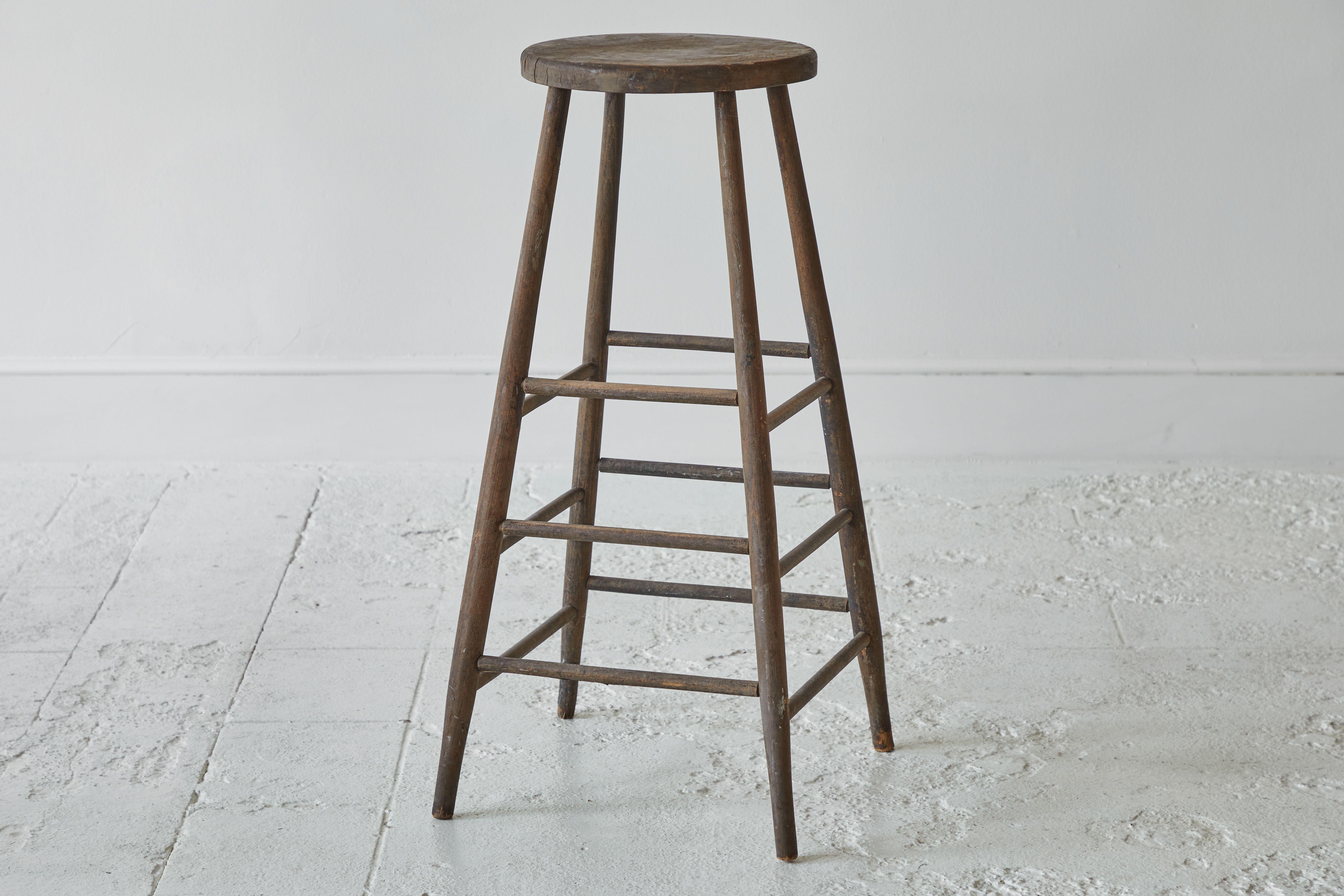tall rustic wooden stool