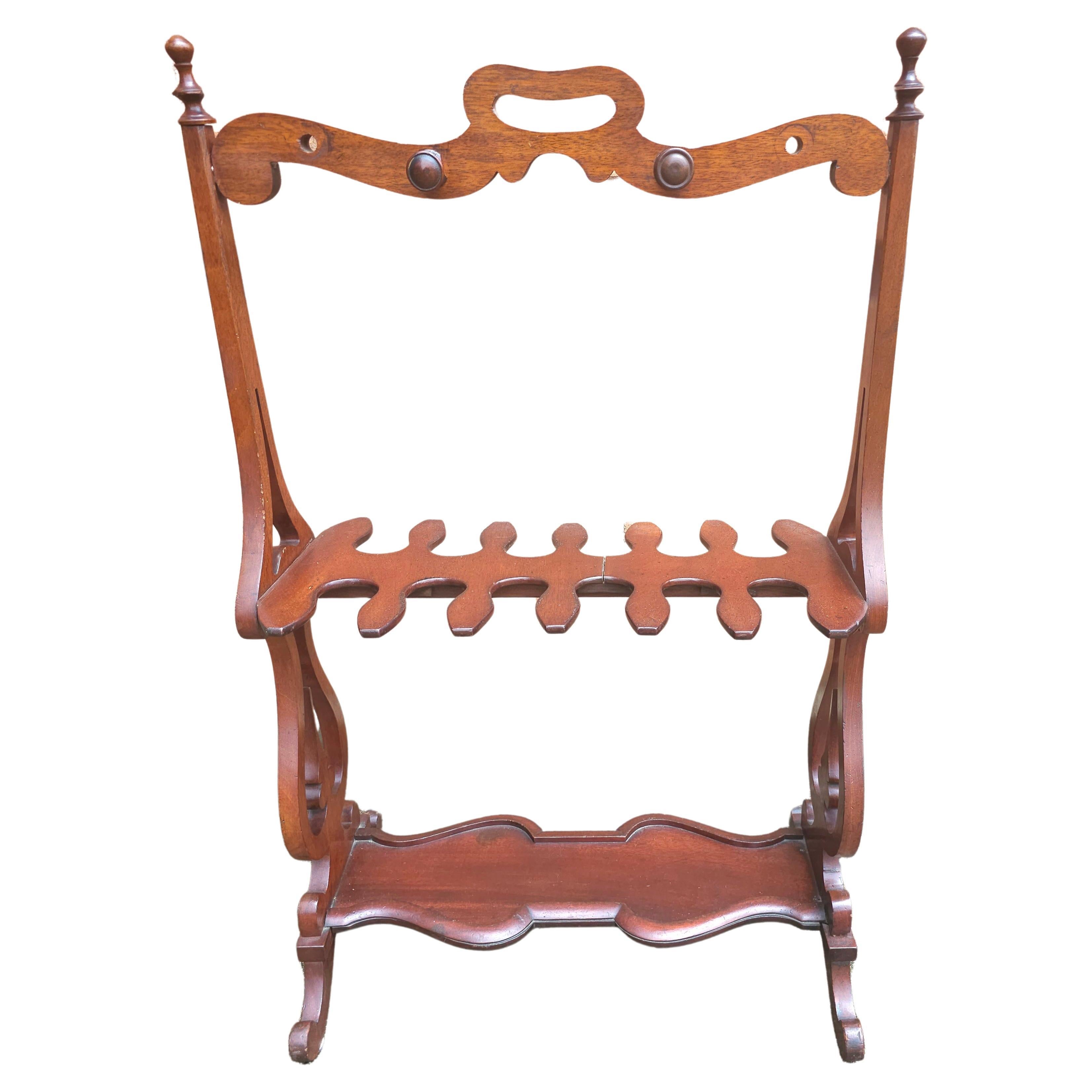 An Early American Style Mahogany Riding Boot Rack in good vintage condition.
Measures 25