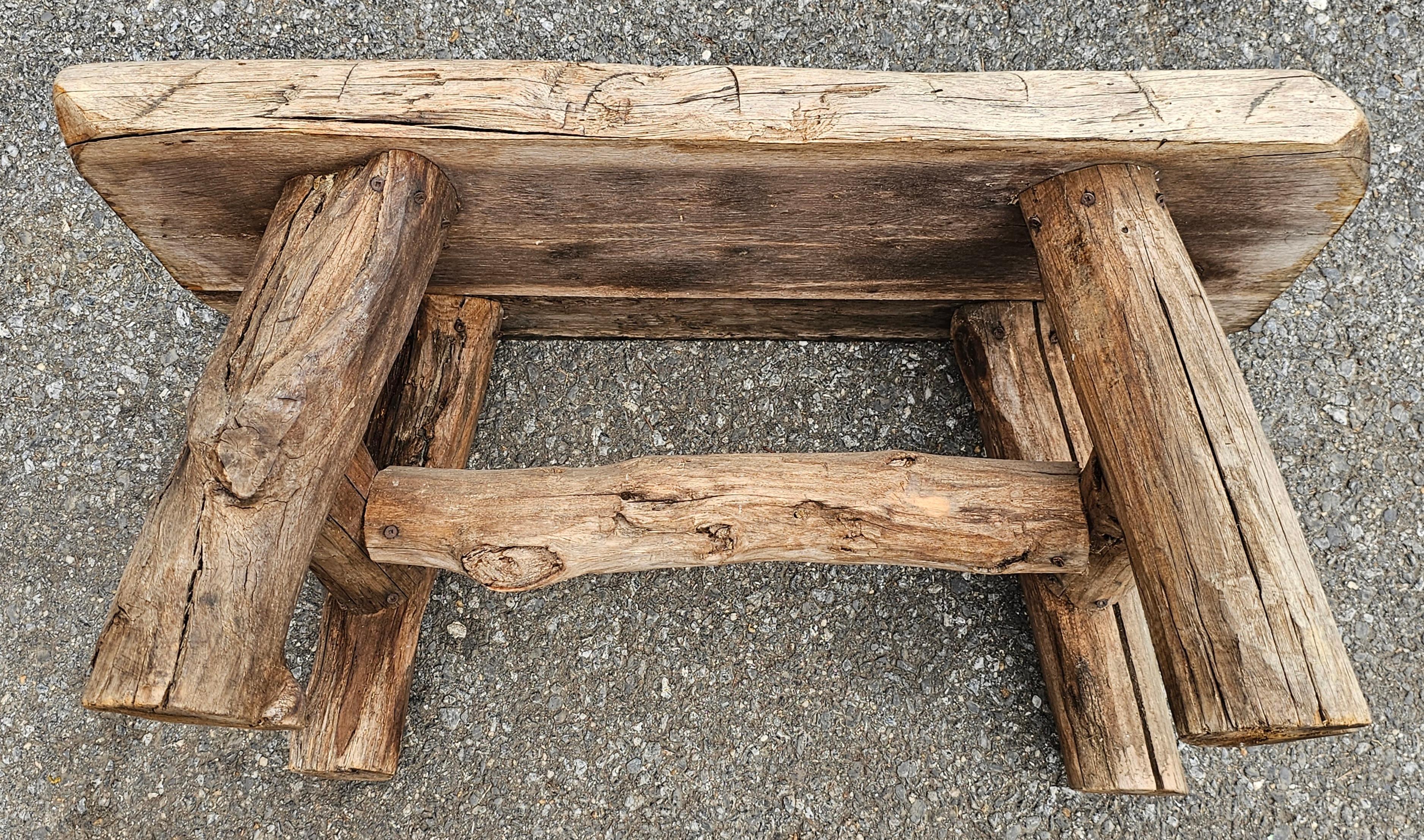 20th Century Early American Style Rustic Stretcher Pine  Log Bench For Sale