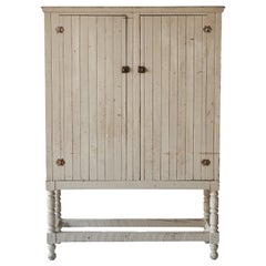 Early American Tan Painted Two Door Cupboard on Legs