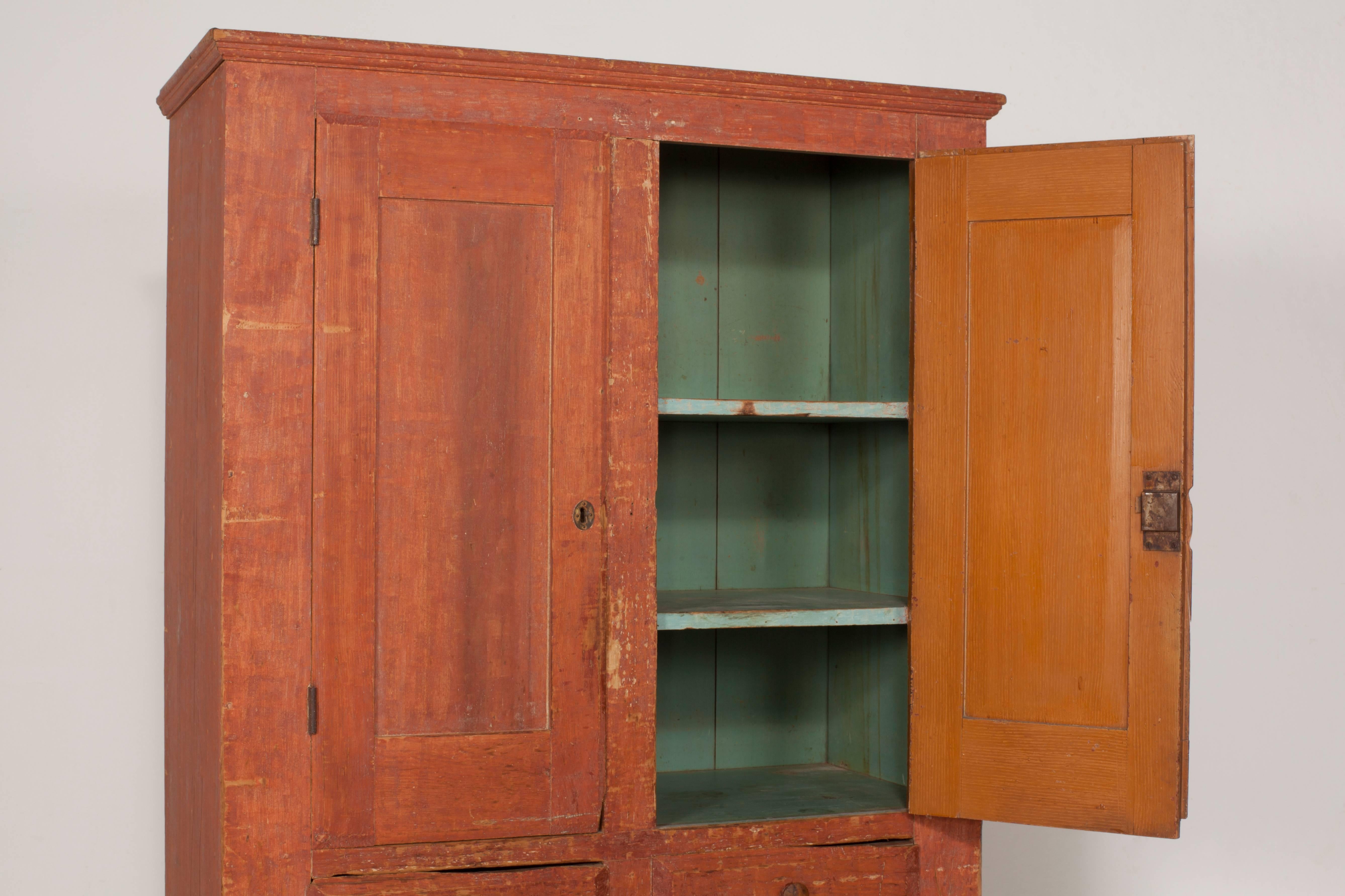Early American Terra Cotta Stained Cabinet with Four Doors and Two Drawers 6