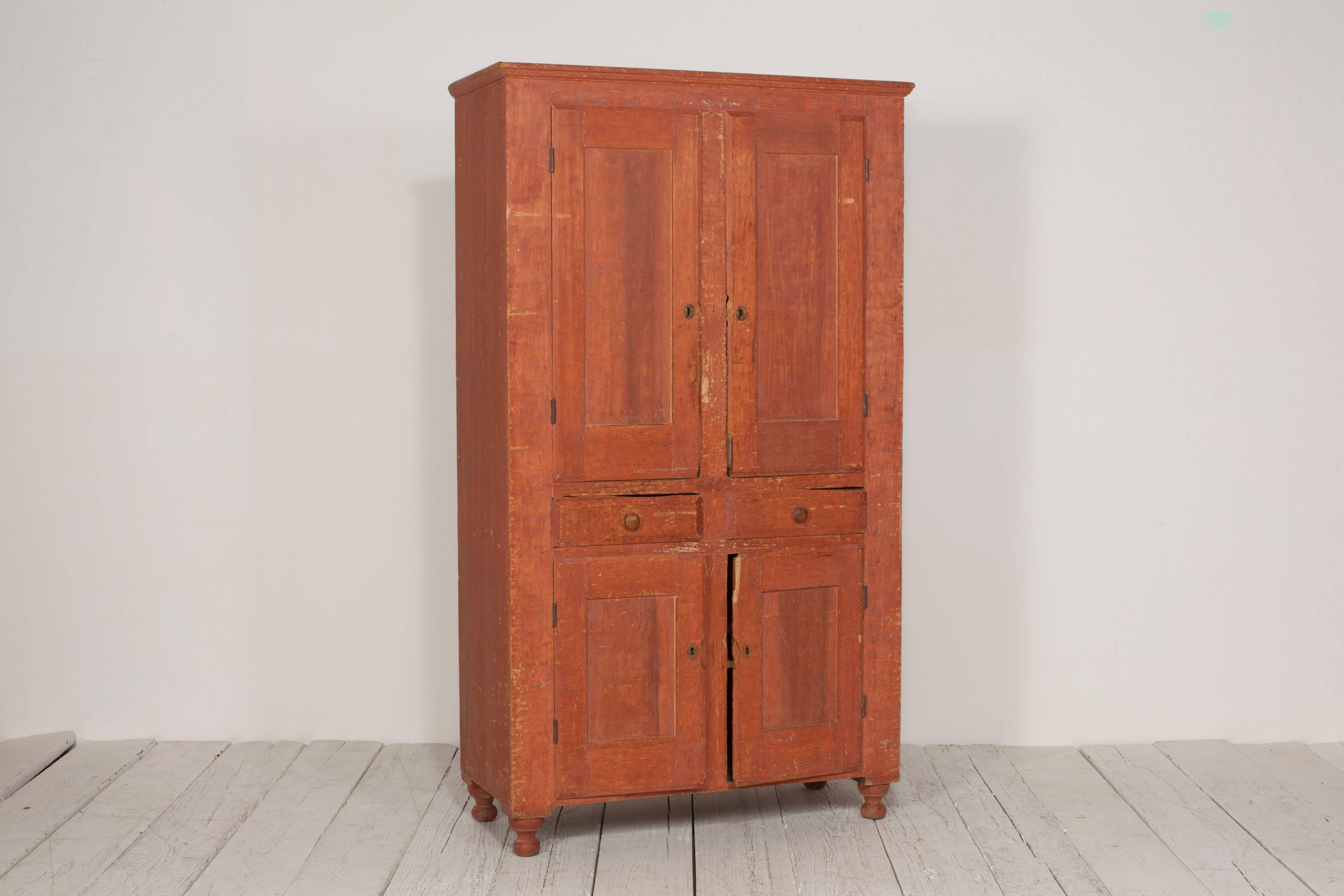 Early American Terra Cotta Stained Cabinet with Four Doors and Two Drawers 4