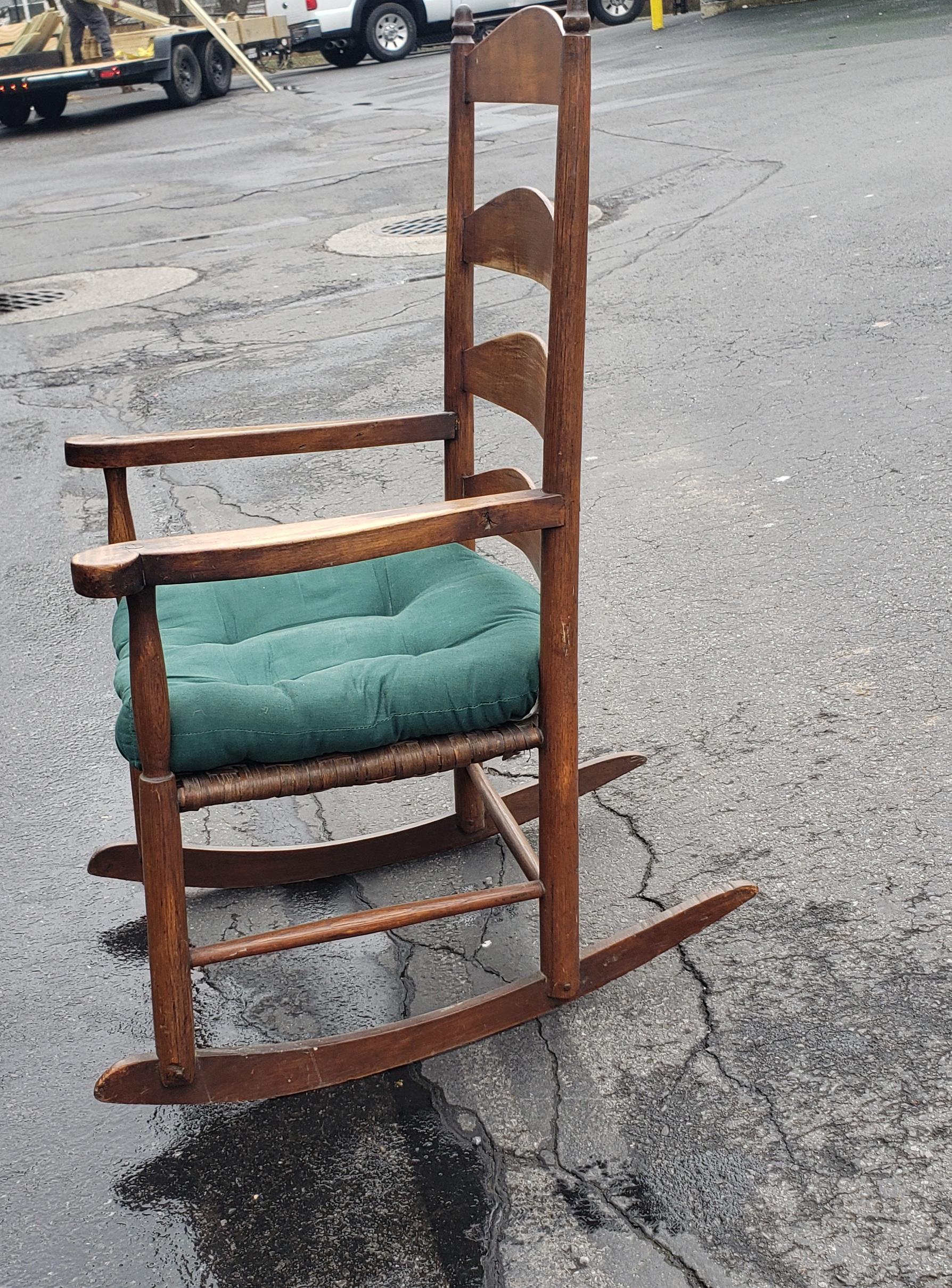 20th Century Early American Walnut Ladder Back Rocking Chair w/ Double Sided Split Reed Seat For Sale
