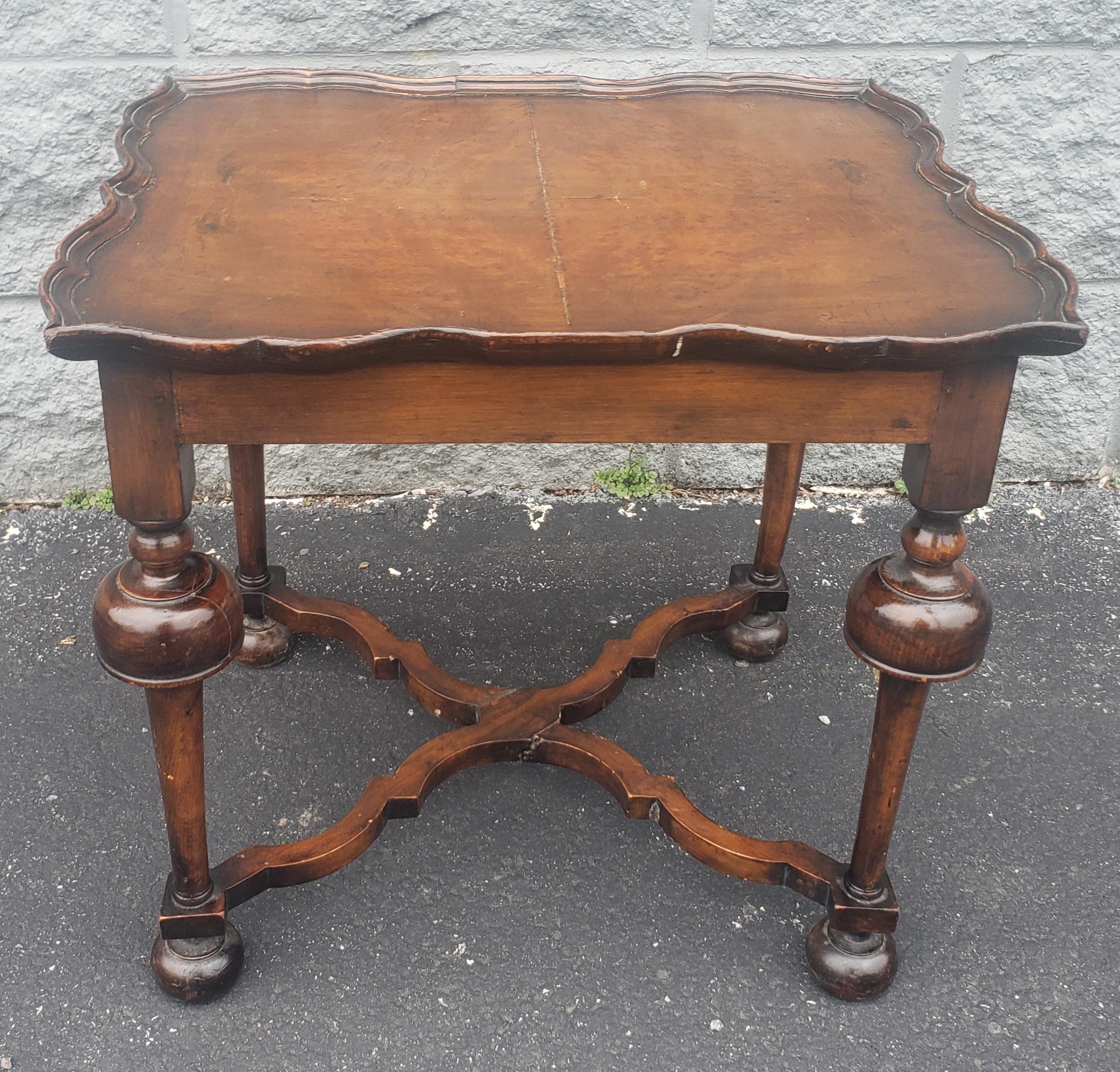 An exquisite Early American William and Mary walnut and burl side table dating from the 1890s. Nice walnut burled top with great patina. Measures 20