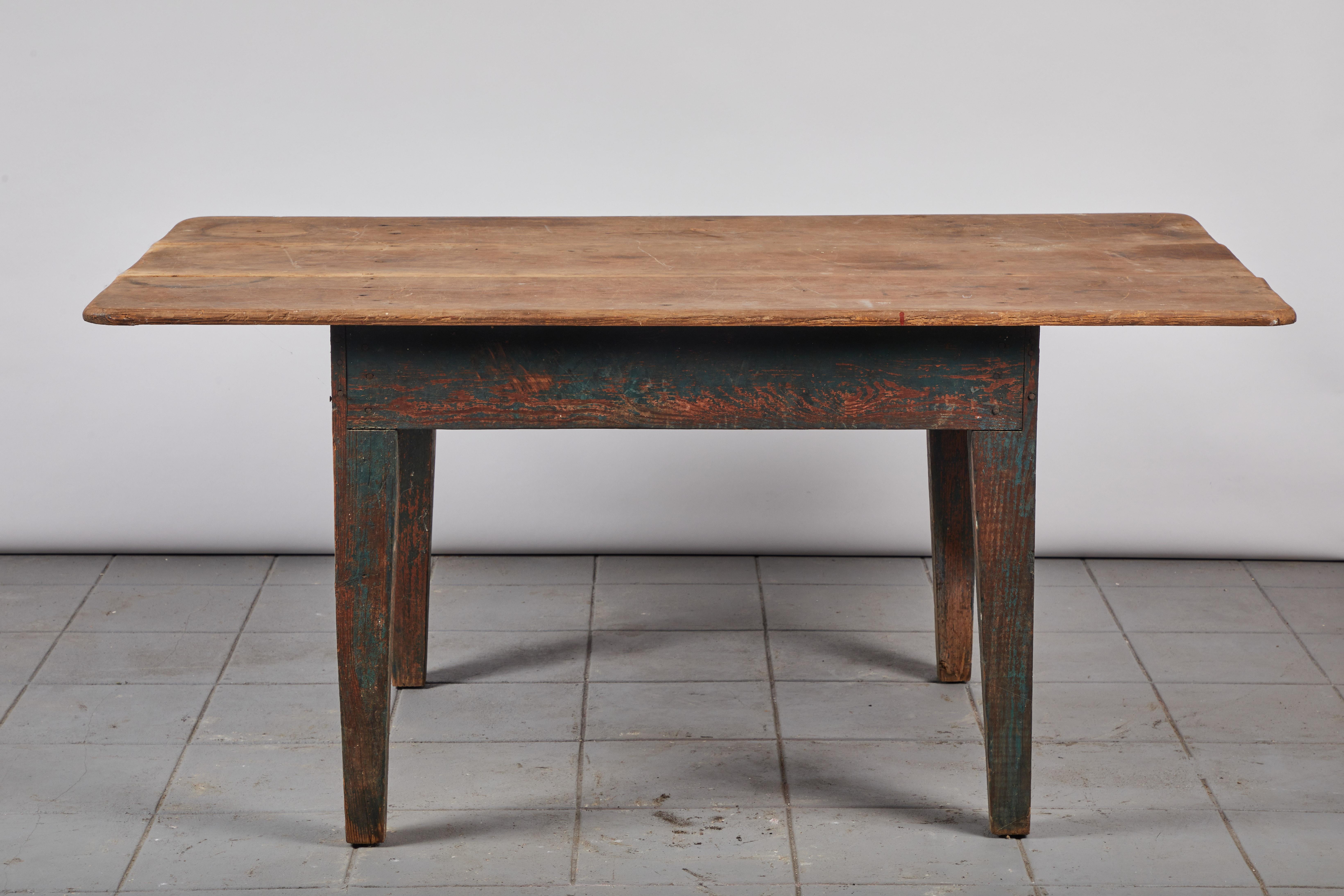 Rustic Early American work style dining table.