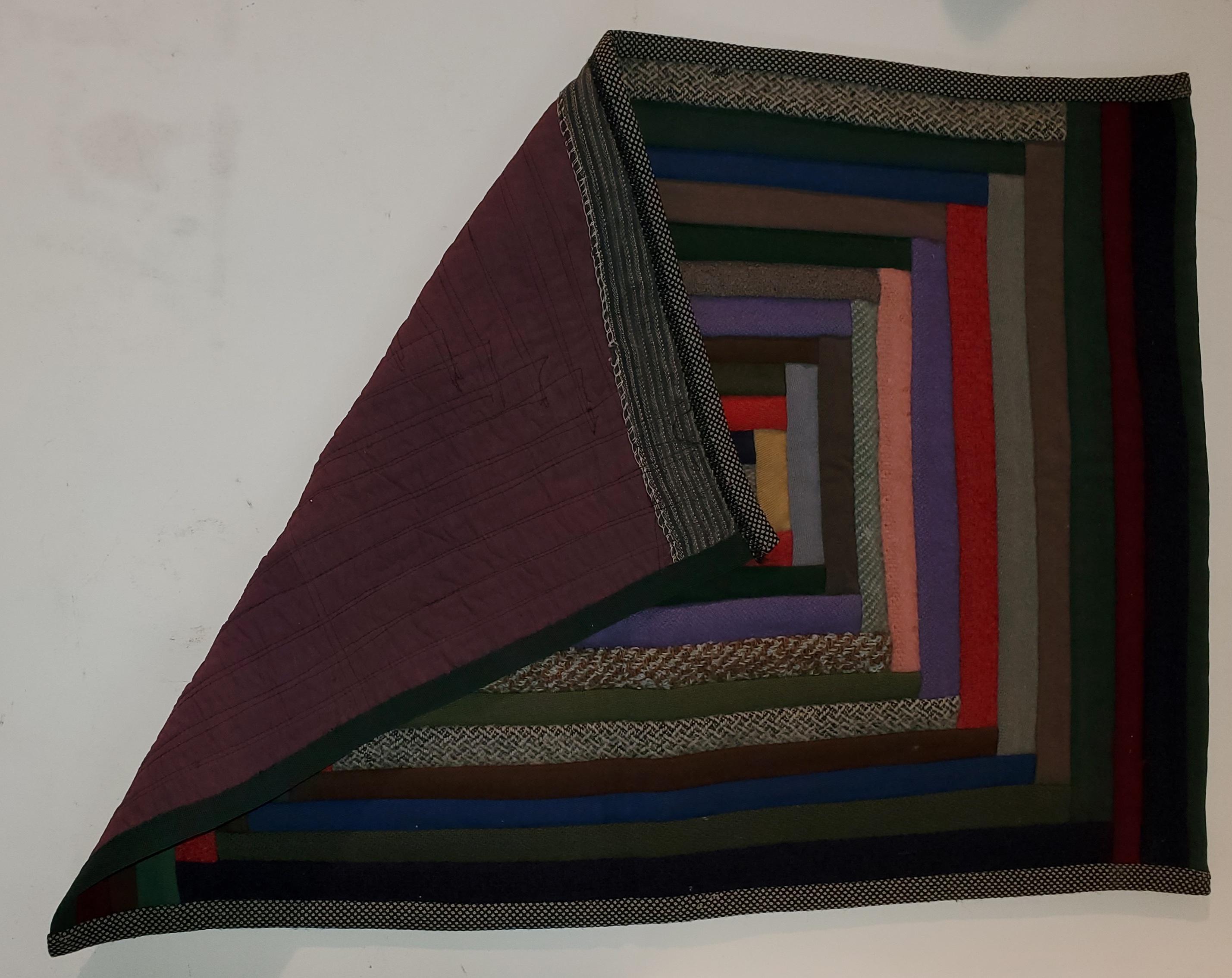 This early Amish crib quilt is from a Lancaster County, Pennsylvania private collection and is quite unusual. The condition is amazing and has been trundle machined over to stabilize the crib quilt. The condition is very good.