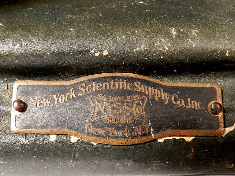 This is one of the earliest examples of hard rubber casting. I'm guessing 1915 to 1920. It's hand painted and very heavy for its size. There is a domed brass plaque that reads New York Scientific Supply Co. Inc.
 
