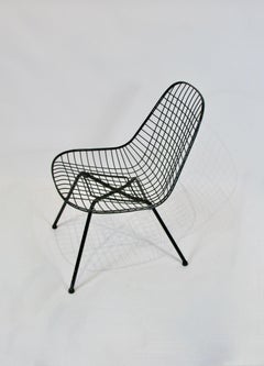 Early and first generation Eames Herman Miller LSX wire lounge chair on X base