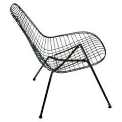 Early and first generation Eames Herman Miller LSX wire lounge chair on X base