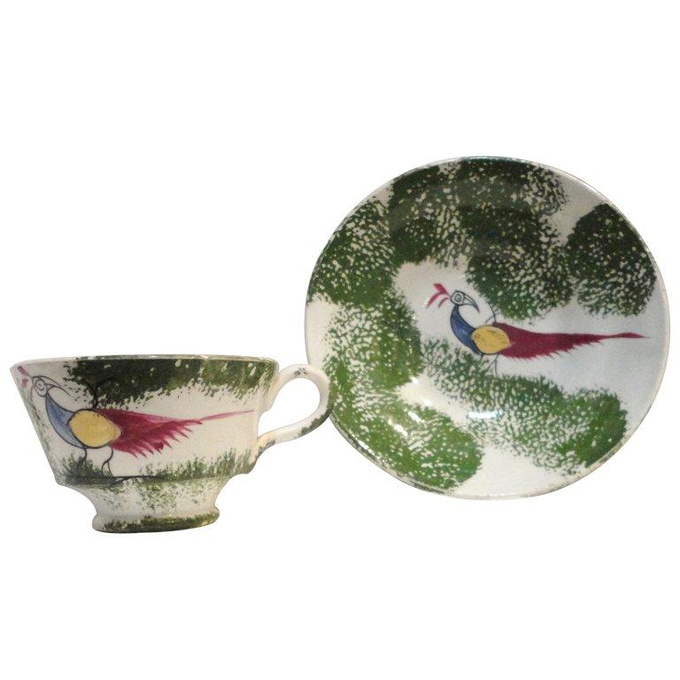Early and Rare 19th Century Peafowl/Stick Spatter Childs Cup and Saucer For Sale