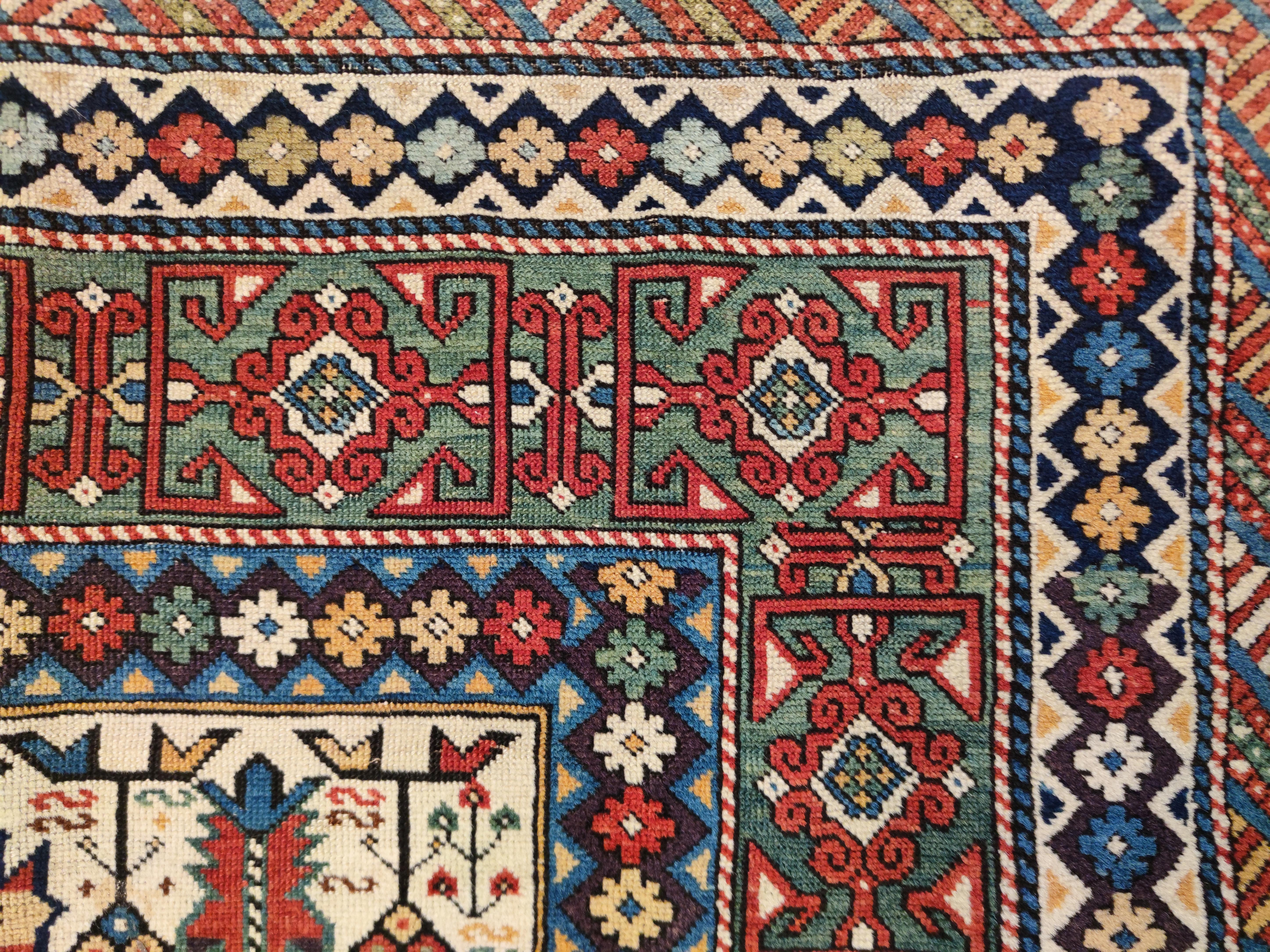 Kazak Early and Rare Antique White Ground Kuba Chi-Chi Caucasian Rug   For Sale