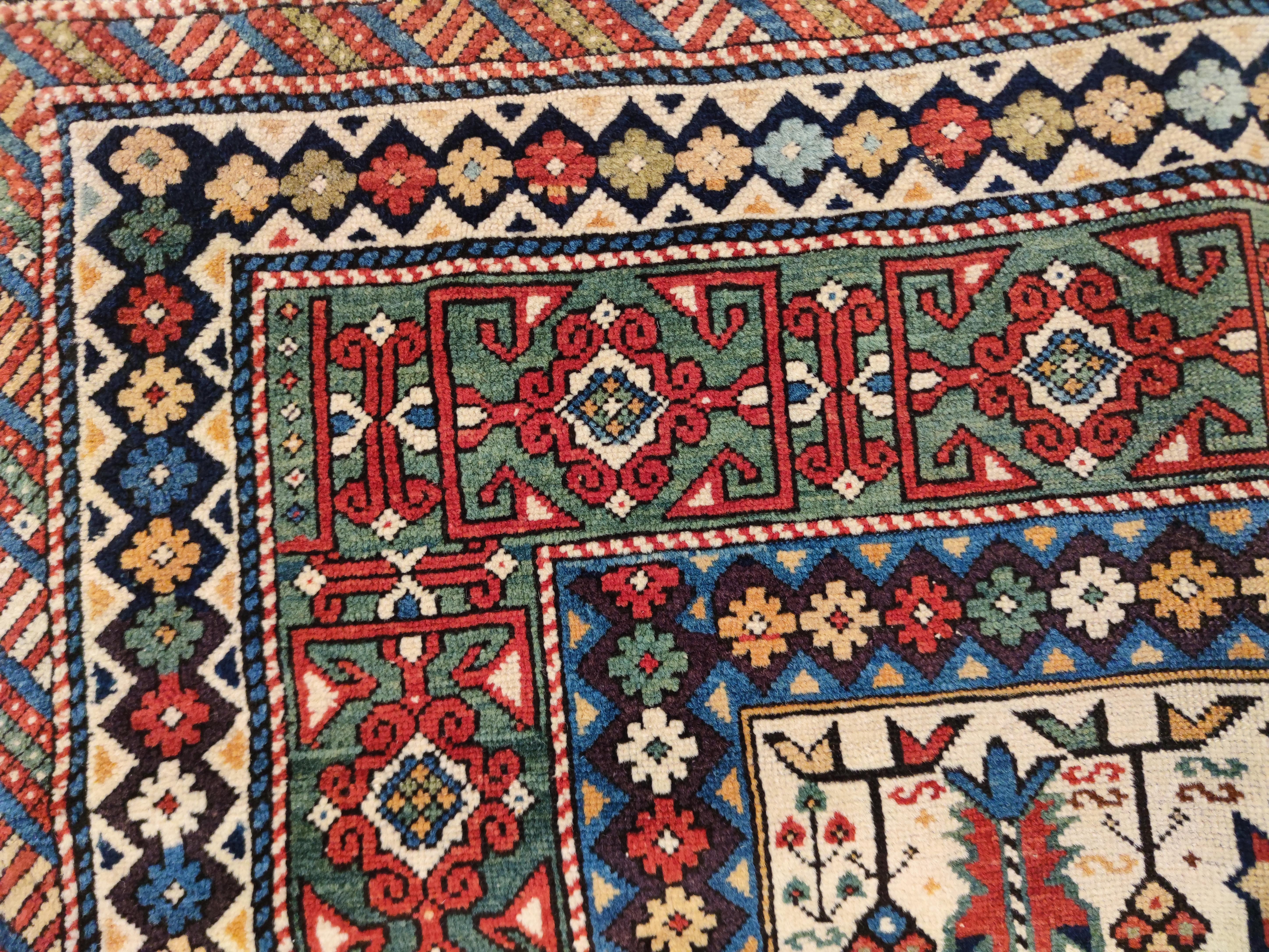 Hand-Knotted Early and Rare Antique White Ground Kuba Chi-Chi Caucasian Rug   For Sale