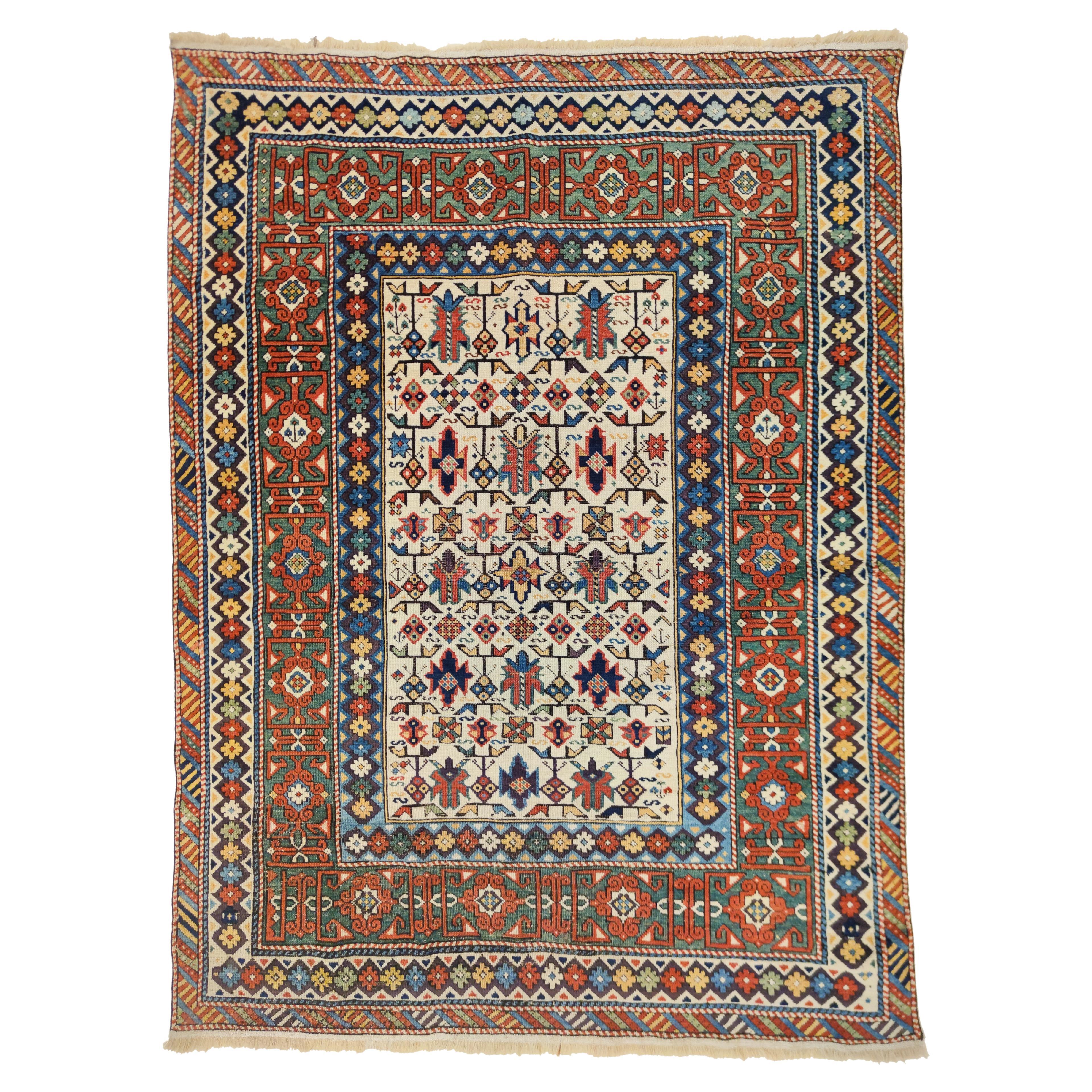 Early and Rare Antique White Ground Kuba Chi-Chi Caucasian Rug   For Sale