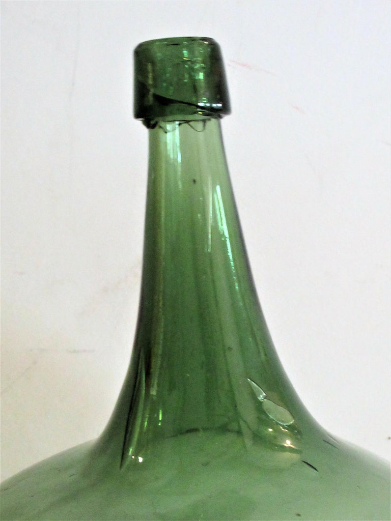 Early Antique American Blown Glass Green Demijohn Bottle at 1stDibs
