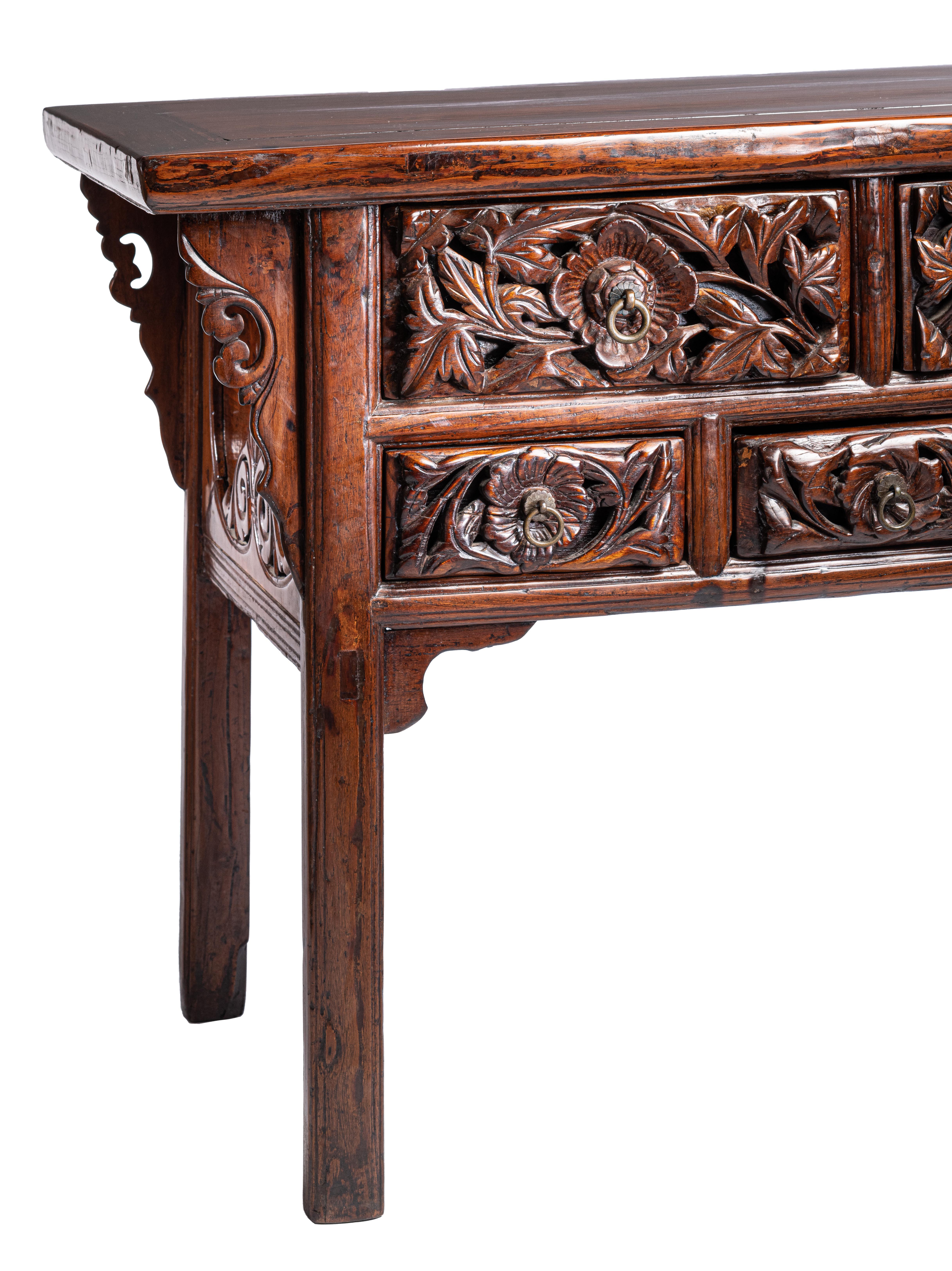 Fine Raised Coffer

The fine raised coffer with a floating top panel, enclosed within a frame with a molded ice-plate edge, supported on recessed rectangular-sectioned recessed legs decorated with open-carved ruyi foliage spandrels, a pair of