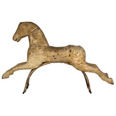 Cheval à bascule en bois d'art populaire ancien