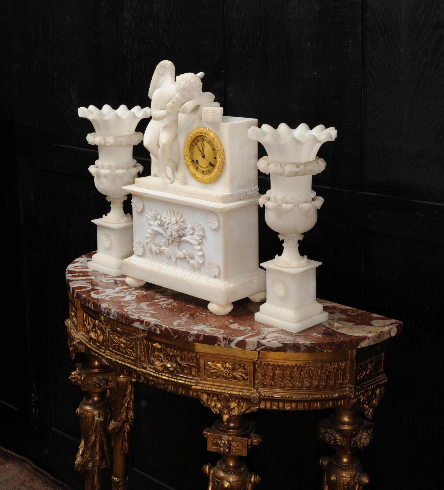 Carved Early Antique French Alabaster Clock Set, Cupid L’Amour Menaçant after Falconet For Sale