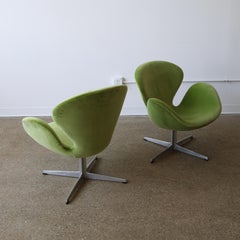 Early Arne Jacobsen “Swan” Chairs, a pair