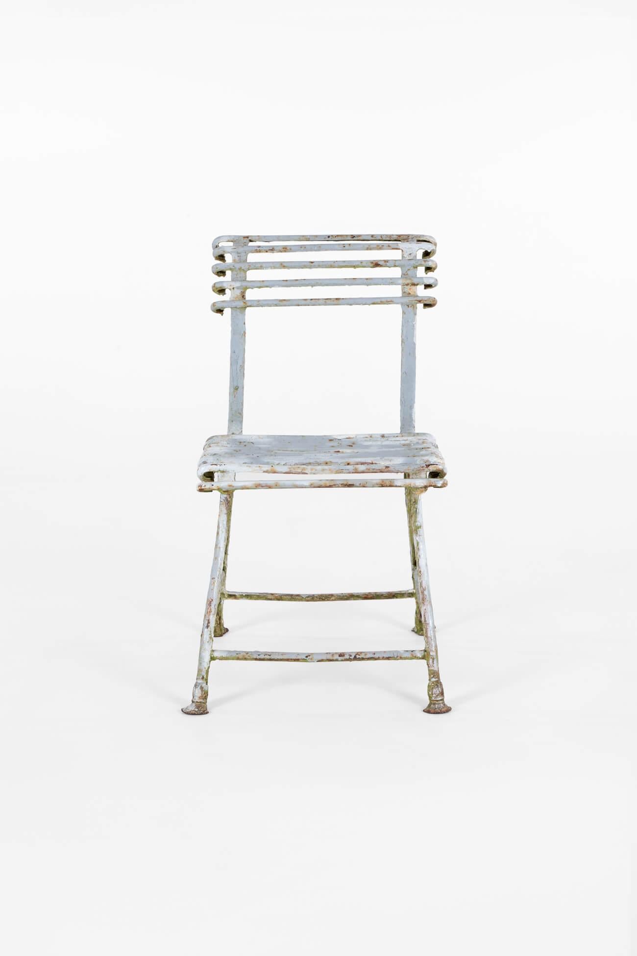 A pretty Arras Orangery or Garden chair from the famous iron factories in the town of Arras, Northern France.

This wonderful example is a blacksmith-made rivetted chair in wrought iron displaying superb age-related wear throughout.

The chair