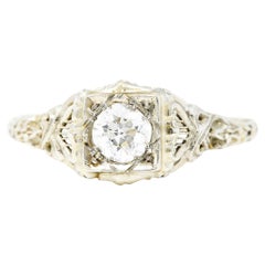 Vintage Early Art Deco 0.48 Carat Diamond 18 Karat White Gold Flourished Engagement Ring