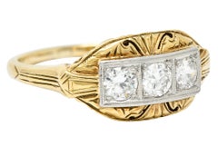 Early Art Deco 0.65 Carat Diamond Platinum-Topped 14 Karat Gold Dinner Ring